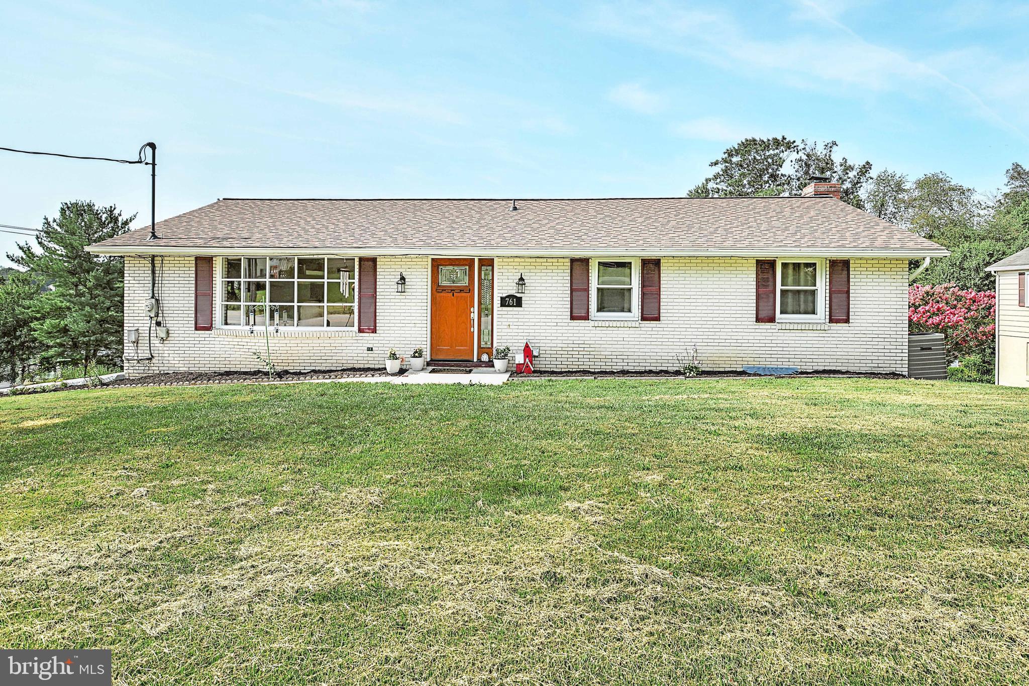 What a find!  This 1400 square foot, all brick ranch home, situated on 1/3 acre has a new roof and a new septic system.  Inside you’ll find a beautiful new kitchen, engineered hardwood, and open layout. Cozy up in the winter to the woodstove located in the living room.  Bring your ideas to finish this awesome daylight, walk-out basement with a wood burning fireplace. Additionally, there are 6 panel wood doors ready to replace the old doors in the main living area.  Who could ask for more?  The sellers are also offering a home warranty. This home is priced to sell!