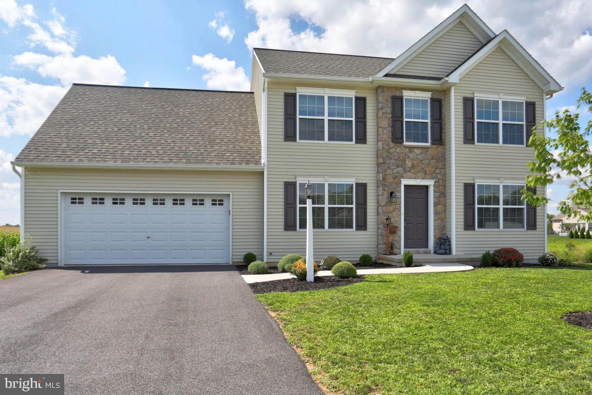 Spacious 4 bedroom home in The Reserved at Union School located in quiet cul de sac. Features eat in ktichen with island and breakfast bar, fireplace in family room and first floor laundry room. Master suite with sitting area, walk in closet and access to attic. Full basement ready to be finished, oversized 2 car garage for storage and rear deck leading to backyard that opens to farmland.