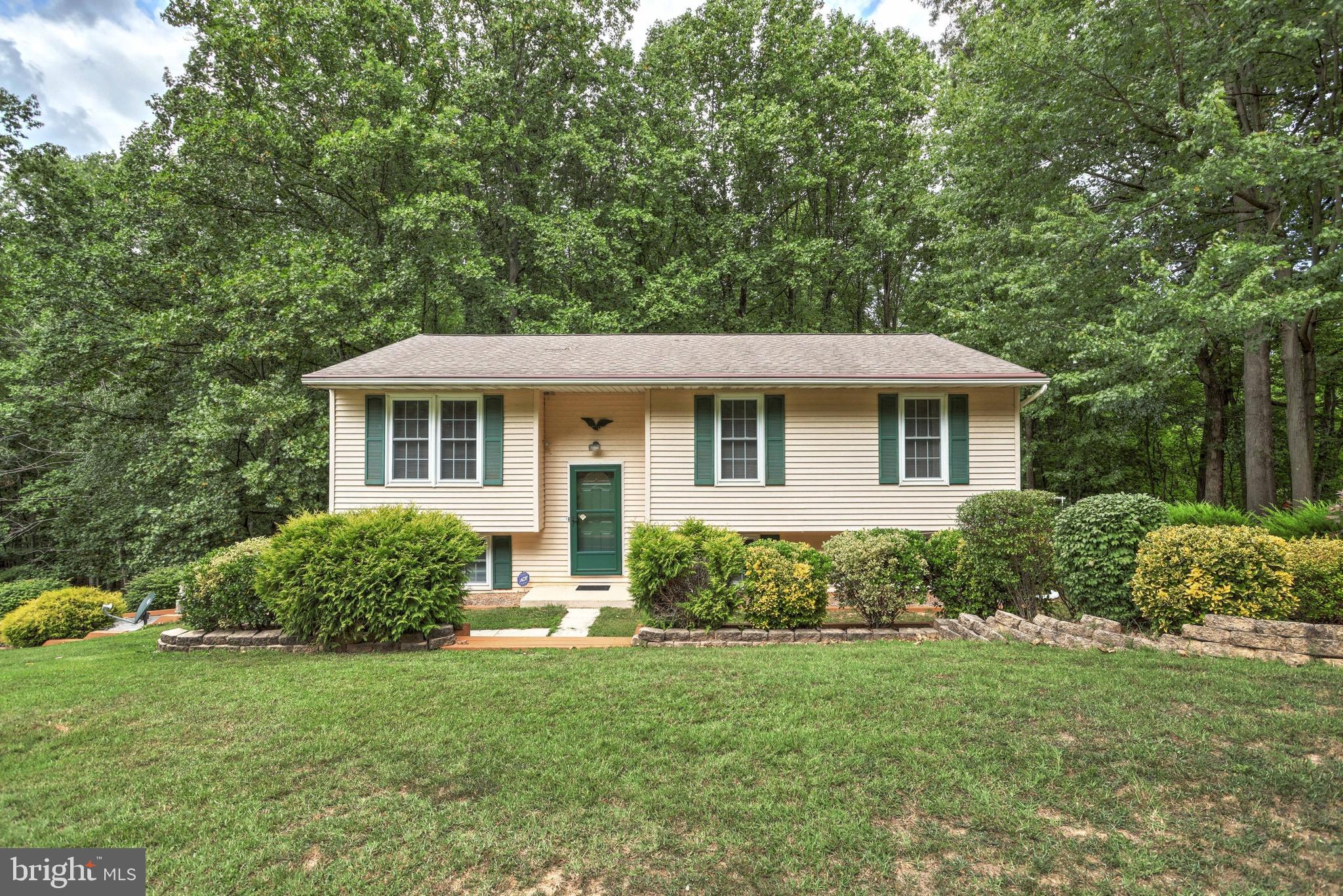 Welcome to 690 Arbor Dr. in Westminster This home is located 1 mile from the Pa/Md line and only 10 minutes from the hubbub of Westminster. The home has been lovingly maintained and improved by the present owner for almost 26 years. You'll love the well equipped kitchen that offers plenty of cabinet and counter space and updated stainless steel appliances. The kitchen opens to the cozy living and spacious dining rooms which all have crown molding. There is access through the Dining Room to the upper deck that runs the full length of the house.  There are 3 good size bedrooms with ample closet space and an undated shared full bath to finish this level. The lower-level is completely finished. The cozy family room is complete with a pellet stove that provides warmth on cold winter days, a fourth bedroom that could be used as a private office/craft room and an updated powder room for guests plus a laundry and utility room with a small chest freezer and storage cabinets.  There’s a large oversized detached two-car garage with unfinished interior waiting for that do-it-your-selfer to set it up the way they want. Don't miss out on this great house, in a great location with easy access to commuter routes  Some of the Other features included with this home are a whole house generator and gutter guard. The back of the house offers an expansive deck over a patio that both run the length of the house where you can enjoy the serenity of the park-like setting of the 2.38 acres or take a stroll through the mature trees to find a babbling brook along the back of the property.   So, If you have been looking for a piece of nature in the city here it is schedule your showing ASAP.
