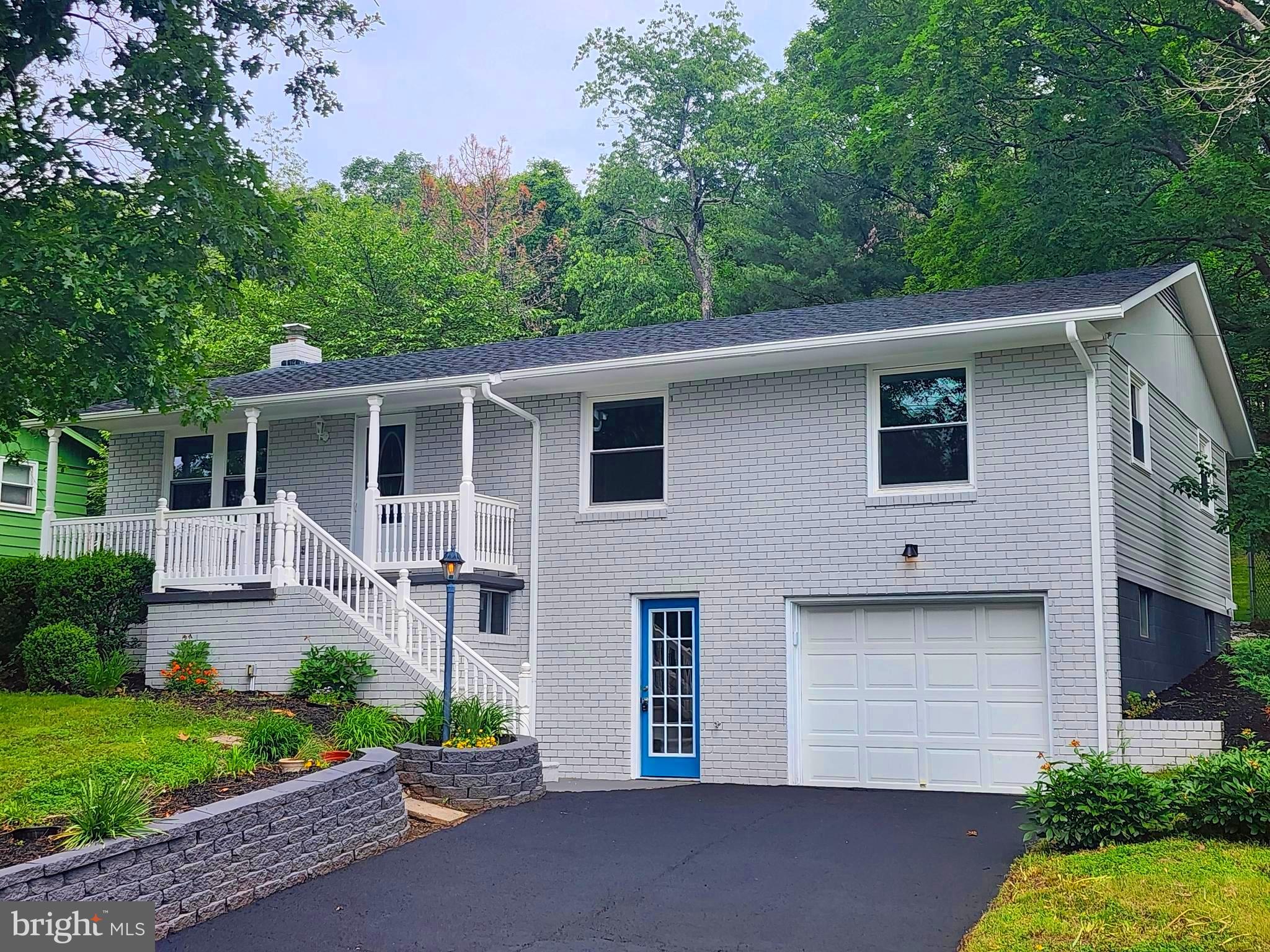 Total Makeover! This beautifully remodeled home features a new roof, siding, windows, floors. The kitchen has been upgraded with sleek stainless steel appliances and elegant granite countertops. 
 Enjoy the luxurious new baths and a spacious recreational room. With 4 bedrooms and 3 full baths, this home offers 2,310 sf of ample space for comfortable living. The new deck overlooks serene woods, providing a peaceful retreat. All kitchen appliances convey, and there's convenient parking availablen including a one car garage.  Walk to the neighborhood pool from here! Bel Air is home to an elementary school, pickleball courts, a sports pavillion, baseball fields, a pizza shop, pharmacy, post office, gas station, convenience store, bank and more! Move-in ready and waiting for you to make it your own. Schedule a tour today!