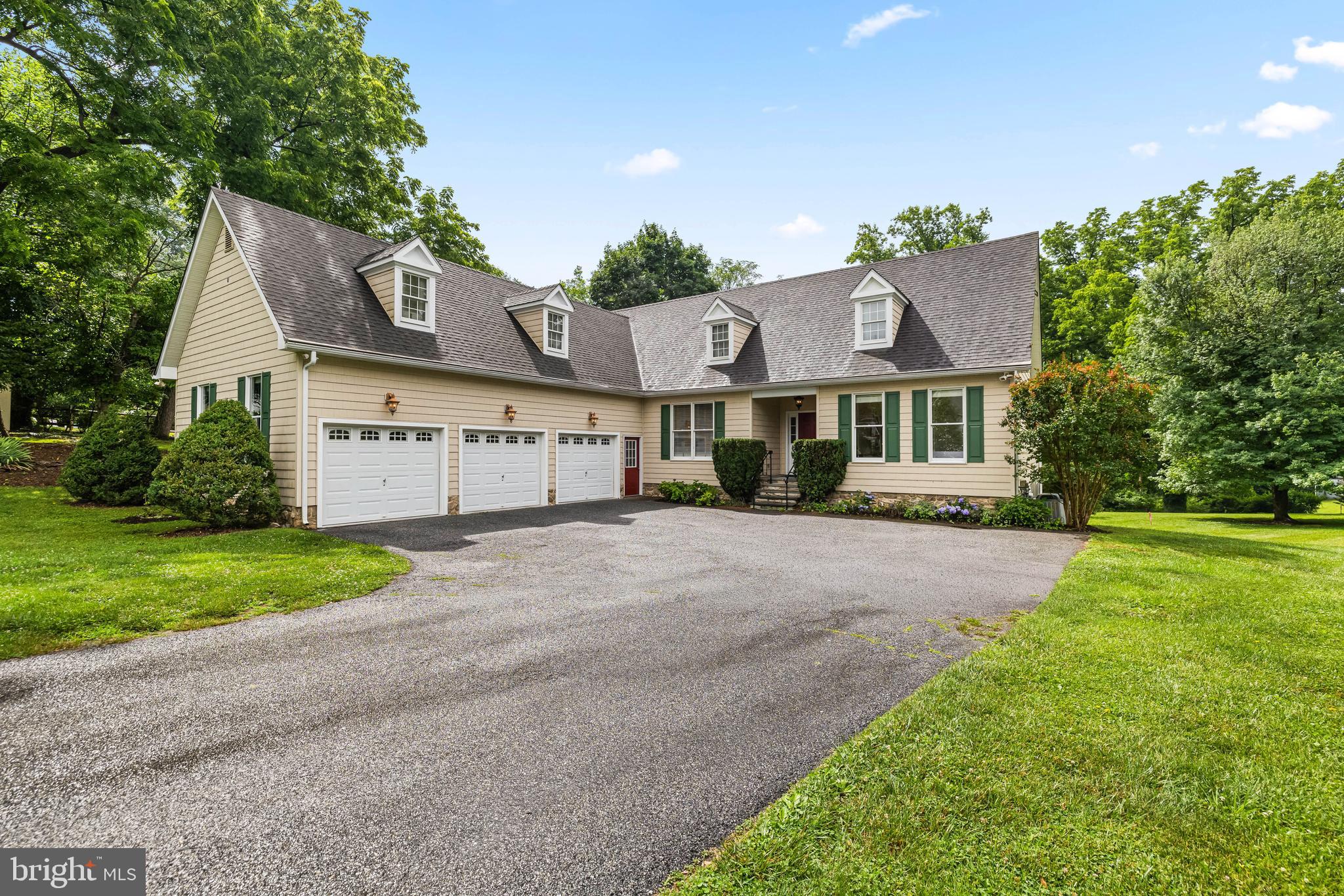 Come view this exceptional home in West Towson, thoughtfully designed for entertaining with abundant natural light, and multi-generational living. Ideally located just a short walk from downtown Towson and the YMCA. This spacious residence offers an open floor plan with versatile living spaces throughout.

The main level features 9-foot ceilings, beautiful hardwood floors, an office space, and a large kitchen with a center island and a generous pantry closet. The adjoining dining area is highlighted by a two-sided gas fireplace that also serves the inviting living room, creating a warm and welcoming atmosphere for gatherings. The primary suite is conveniently located on the main level and includes a large walk-in closet, a spacious bath with a separate shower and soaking tub, plus access to a private porch featuring a gas-fired stove for year-round enjoyment.

Also on the first floor is a private in-law suite, complete with a bedroom and private full bath, kitchenette with pantry, a combined living and dining area and access to its own private porch offering comfort and independence for extended family or guests. A powder room, laundry room, and interior access to the three-car garage complete the main level.

The walkout lower level features 8-foot ceilings and an open layout with three additional bedrooms and two full baths. Designed for entertaining, the expansive recreation area includes hardwood floors and a custom bar equipped with glass-front cabinetry, refrigerator, dishwasher, ice maker, wine storage, sink, and seating area. A comfortable entertainment area with a gas fireplace provides an additional gathering space and offers easy access to the rear yard.

Outdoor living is equally impressive with two spacious patios overlooking the rear yard.  One patio features a hot tub, perfect for relaxing or entertaining family and friends. This unique property seamlessly blends comfort, functionality, and easy living in one of Towson's most desirable locations.