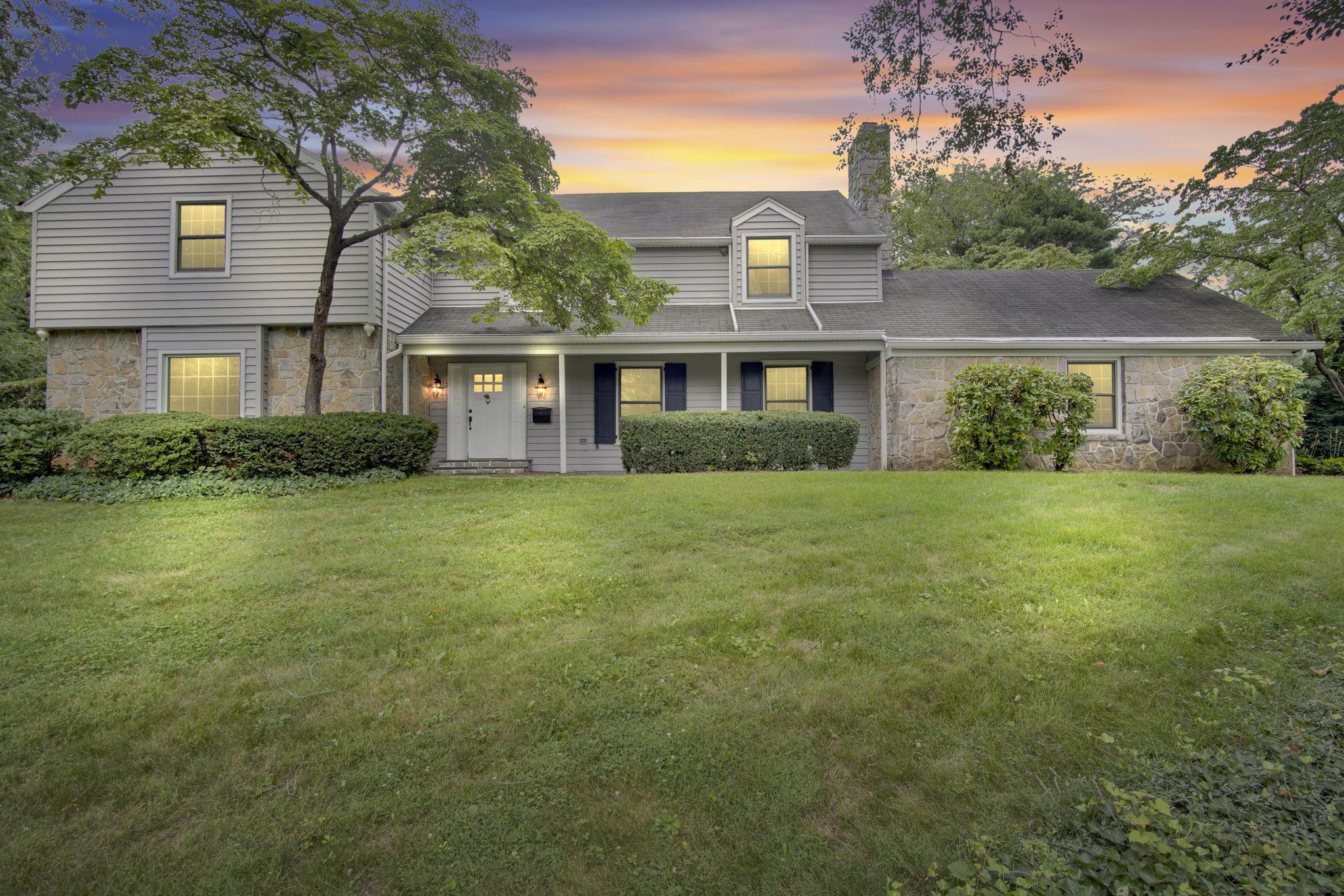 Nestled in Old Mooreland neighborhood, this exceptional traditional home offers the rare combination of timeless character, serene seclusion, and in-town convenience on over 1.5 acres in Carlisle. With more than 3,400 square feet of living space, this six-bedroom, five-bath residence provides remarkable flexibility for today’s lifestyle. The home showcases beautiful wood craftsmanship throughout, multiple fireplaces, generously proportioned living spaces, and design elements that create a warm and inviting atmosphere. The thoughtfully designed floor plan offers endless possibilities for gathering, entertaining, working from home, or accommodating multi-generational living. The main level features an eat-in kitchen, formal dining room, living room with fireplace, large family room with fireplace, two half baths, and a private study that could easily serve as a seventh bedroom. Upstairs, you’ll find six spacious bedrooms and three full baths, providing ample space for family and guests alike. Designed for entertaining both indoors and out, the 16’ x 30’ sunroom opens to an expansive outdoor living space overlooking the included lots, creating the perfect setting for everything from intimate gatherings to large celebrations. Mature landscaping and the property’s generous footprint provide an uncommon sense of privacy and tranquility rarely found within town limits. Additional highlights include abundant storage and expansion opportunities within the partially finished basement. Homes of this caliber in Old Mooreland are a rare offering, blending historic charm, exceptional craftsmanship, and modern livability in one of Carlisle’s most beloved neighborhoods. Schedule your private showing today.