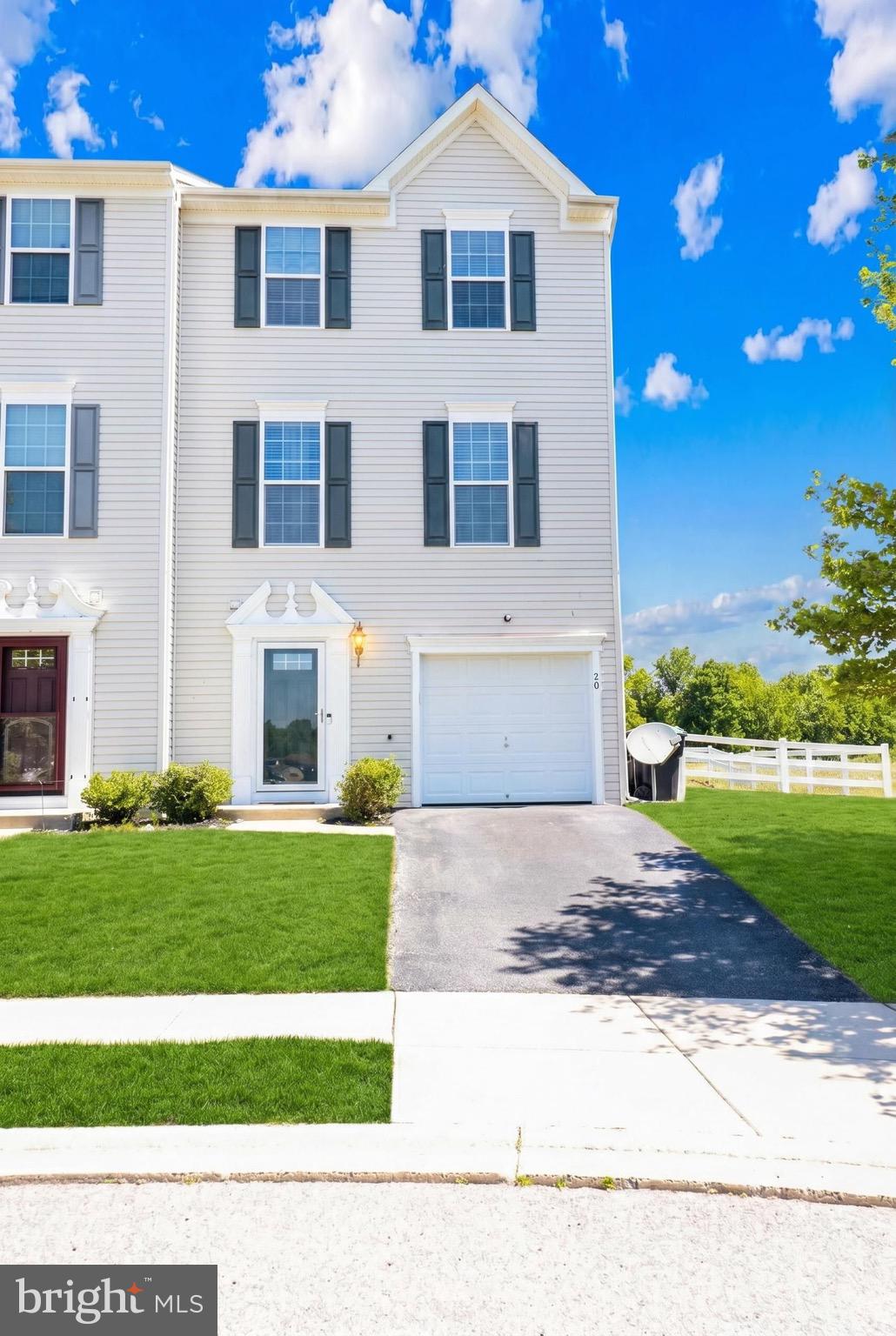 Beautiful end unit 3-bedroom, 2.5-bath twin home located in the sought-after Smyrna area! This spacious three-level home offers over 1,500 square feet of versatile living space designed to fit a variety of lifestyles. The entry level features a welcoming foyer, powder room, garage access, and a large flexible bonus room with sliding glass doors leading to the backyard  currently set up as an additional bedroom, but perfect for a home office, gym, playroom, guest space, or second living area.

The main level offers an open-concept layout with a bright living room, spacious kitchen and dining area, recessed lighting, and access to the large composite deck overlooking the beautiful fenced backyard and open views. Upstairs you’ll find all three bedrooms, including a generous owner’s suite with double vanity and oversized shower, plus convenient upper-level laundry. Complete with a 1-car garage, washer and dryer, and plenty of indoor and outdoor space to enjoy, this move-in ready home offers comfort, flexibility, and room to grow! "Seller entertaining all reasonable offers."