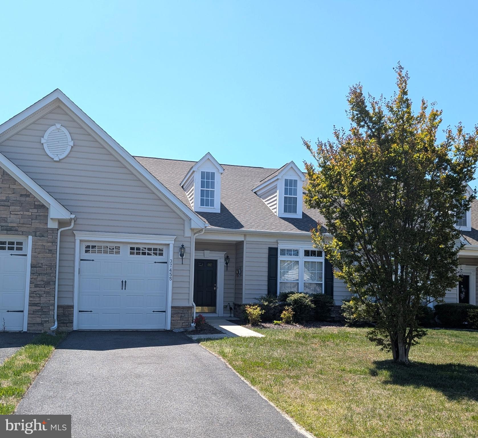 Located just minutes from Fenwick Island & Ocean City Beaches, this 3 bedroom plus loft / 2.5 bath villa style townhouse offers a spacious sunroom with paver patio overlooking the pond.  Home features central AC, fireplace, 1 car garage plus driveway parking and access to a great community pool.  Offered partially furnished.  New Roof in 2024!