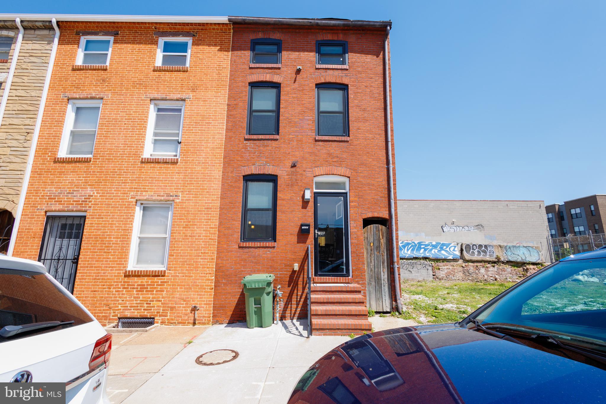 Welcome to 1310 Gough Street! This bright and sunny two-bedroom, two full bath rowhome is perfectly situated in the heart of the highly sought-after Fells Point neighborhood. Meticulously maintained and truly move-in ready, this charming home combines modern updates with classic city living. The main level features beautiful bamboo flooring throughout the living room and kitchen, recessed lighting, and an abundance of natural light that creates a warm and inviting atmosphere. The updated kitchen offers granite countertops, stainless steel appliances, ample cabinetry with unique built-in features, and a stylish shiplap backsplash that adds character and charm. A full bath with laundry hookups completes the main level. The second floor features a spacious bedroom with a walk-in closet and a brand-new full bath completed in 2026, showcasing a luxurious rain shower and modern finishes. The third level offers a private second bedroom, ideal for guests, a home office, or flex space. The unfinished basement provides excellent storage space. Step outside to the rear patio, perfect for outdoor entertaining, dining, or relaxing evenings enhanced by ambient outdoor lighting. Major updates completed in 2023 include electric, plumbing, water heater, and HVAC, offering peace of mind for years to come. Conveniently located just minutes from Little Italy, Harbor East, Johns Hopkins Hospital, and Patterson Park. Enjoy easy access to Canton, downtown Baltimore, waterfront attractions, dining, shopping, entertainment, and recreation. Commuters will appreciate convenient access to I-95 and I-83 for easy travel to Washington D.C., Philadelphia, New York, and beyond. The property was previously used as an Airbnb. Don’t miss your opportunity to own this exceptional city home!