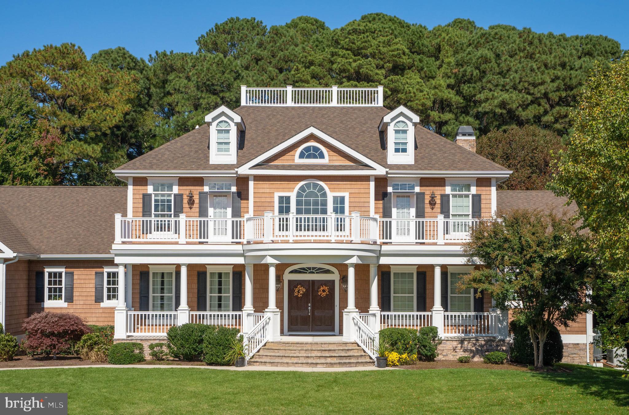 The Epitome of Luxury & Grandeur in Wolfe Pointe.  Can a home promote family harmony?  This one can!  Including an In-Law Suite with full kitchen & separate bedroom, garage chair lift, an elevator serving three of its four full floors of finished living spaces, 3,150 sq ft of outdoor living spaces, a fenced yard for the pooch and even a tree fort & zip line for the kiddos and their friends.  In the spirit of “the more the merrier,” designed for the fulfillment of the young and the young-at-heart.  At even the most conservative of estimates, notwithstanding premium accoutrements such as driveway, landscaping, irrigation system, & fencing, the reproduction cost of 36031 Tarpon Drive exceeds $3,700,000 plus two years of design and construction. Your family’s chapter begins now.  Designed and built as a Play House, one of the detached structures is conditioned.  See list of Outstanding Features attached.