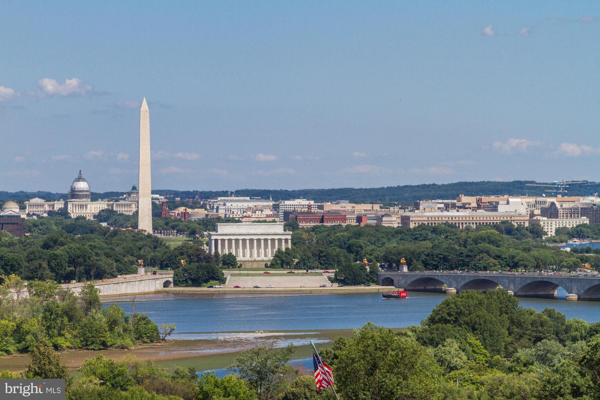 Spectacular views of the Washington Skyline, Potomac River, Monuments, and more, are abundant from this impressive Federal Style TH with private roof deck on the highest elevation of the Monument Place complex.  Gourmet Kitchen with Sub-Zero / Viking appliances, Open Floor Plan. 5 levels w/ Elevator. 2-Car Garage.  Only moments to Georgetown, Downtown DC, the Pentagon, and Reagan National Airport.