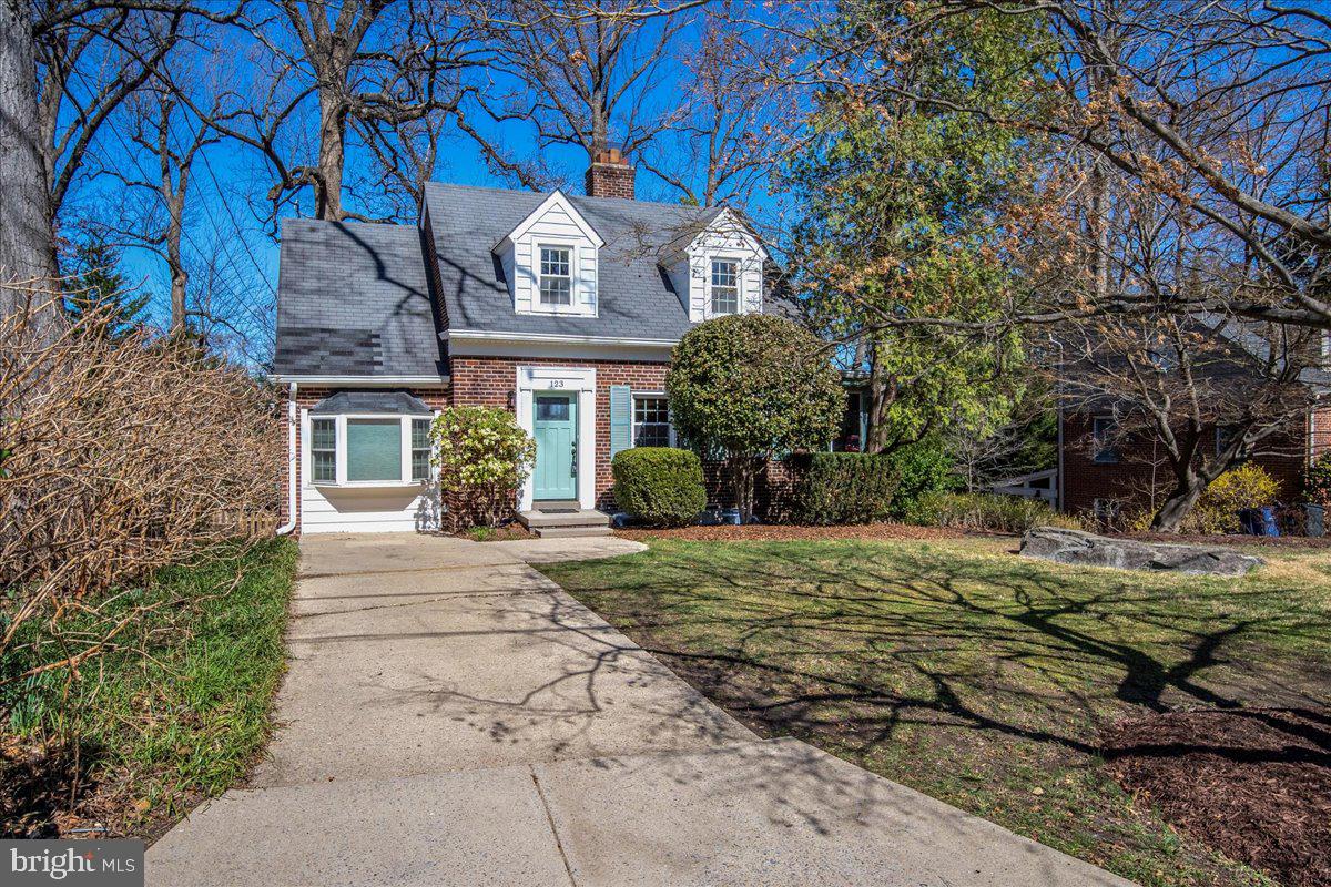 Introducing 123 Northwood Ave in the coveted Northwood Park neighborhood of Silver Spring. This expanded and updated cape cod style home is exquisite. Enter into a spacious living room with built in bookcases and a wood burning fireplace. Continuing on is a spacious dining area and fully renovated kitchen featuring gas stainless steel appliances, quartz countertops and cork flooring. Off the kitchen and dining area is a large sun drenched family room with a built-in window seat and floor to ceiling windows. A private office/bedroom space with en-suite completes the first floor. Upstairs you will find a large primary bedroom with a spacious en-suite, walk in closet and a gorgeous wall of windows providing tree top views! The second floor concludes with two more bedrooms and another full bath. The walk-out lower level provides a second family room or flex space, half bath, and fully finished laundry room. The backyard is an oasis, with a half covered composite deck that steps down onto a stunning flagstone patio, hanging lights, and yard with mature trees. There is also a large under deck storage shed. The Four Corners area in Silver Spring is a lively neighborhood known for its vibrant community and convenient amenities. This home is minutes from Rts 495, 29, downtown Silver Spring, and plenty of shopping!