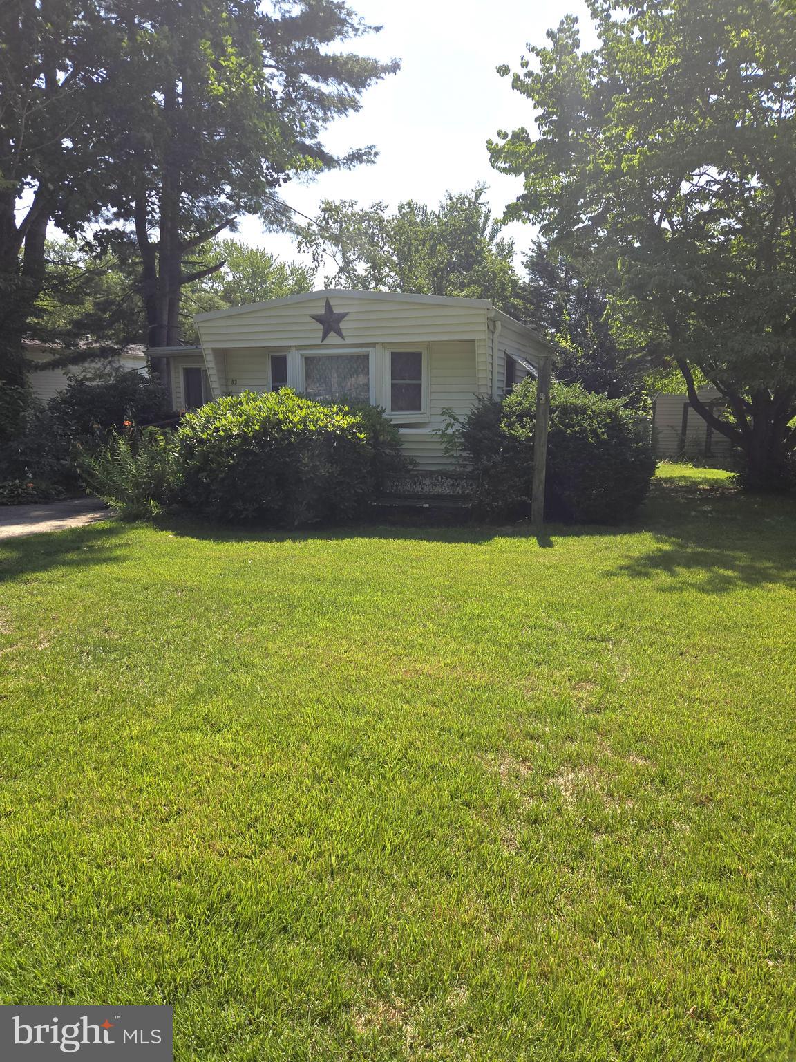 Single wide in MHP on leased ground with an enclosed sunroom, 12x15 storage shed, 2 small decks. MHP features a community pool!