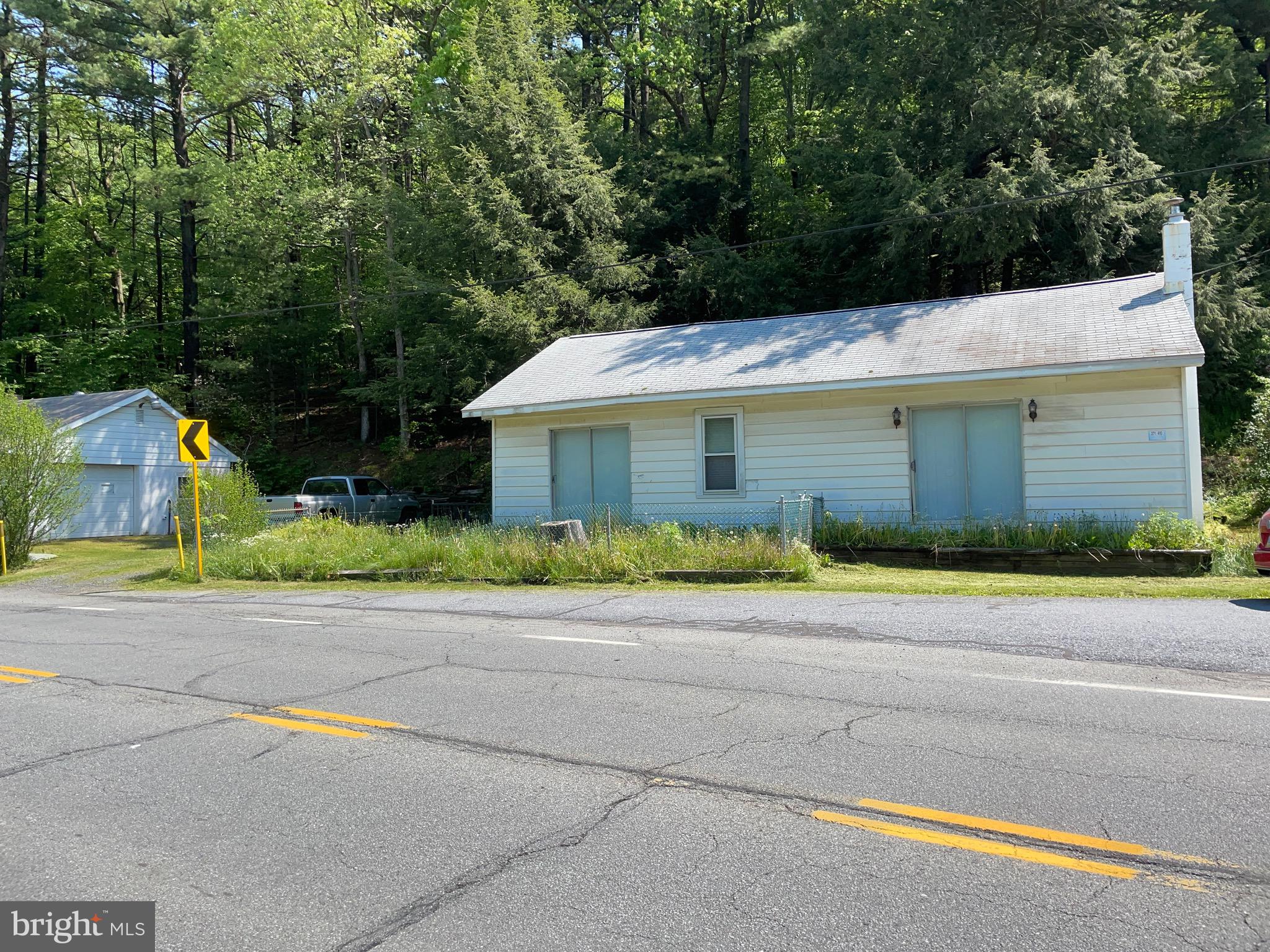 MULTIPLE OFFERS HAVE BEEN RECEIVED. 
THE SELLER REQUESTS THAT HIGHEST AND BEST OFFERS BE SUBMITTED BY SATURDAY MAY 28TH AT 4:PM.



Check out this cozy single home with two beds. One floor living close to services and very commuter friendly .19x20 living room with wood/coal stove.Sun room and eat-in kitchen, in the rough.  This just needs your finishing touches. Large two car garage; well constructed and with electric and heat. bring your project cars!. Driveway will accommodate 2-3 vehicles. Many upgrades were completed three years ago. Bring your tools and shine this gem!