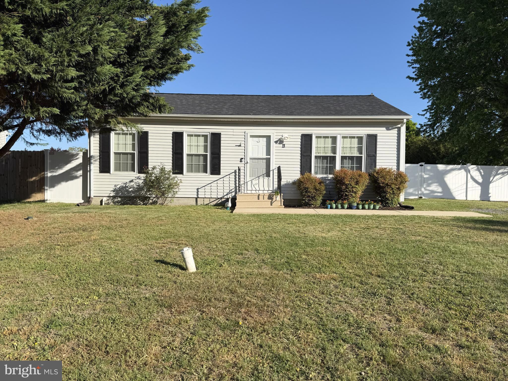 Step into this well kept 2 bedroom, 1 bath rancher and feel instantly at home. Enjoy your morning coffee or an afternoon barbeque on the back patio with a privacy fenced back yard. Recent updates include vinyl plank flooring (2024), New roof, new refrigerator, new light fixtures and a fully encapsulated crawl space with sump pump - french drain and dehumidifier. All that's needed is your touch of color to make this house your home. Don't miss your opportunity on this cozy home in a quiet, charming neighborhood. Call to schedule your showing today.