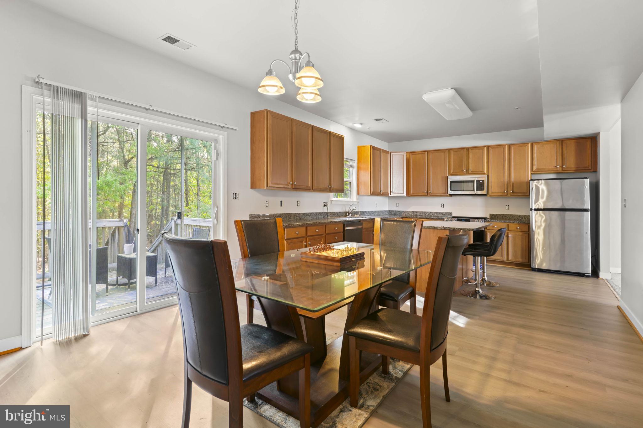 Welcome home to this lovely 3-bedroom, 2.5-bath Colonial situated on a quiet cul-de-sac in Southwoods. This home offers an ideal blend of comfort and accessibility. Step inside to find a spacious kitchen designed for entertaining, featuring granite counters, abundant storage space, a pantry, and a large central island. Select rooms are upgraded with new LVP flooring. The primary suite serves as a restful escape, complete with a full ensuite bath and a walk-in closet. Relax outdoors on the deck overlooking a private, wooded backdrop. Commuting is simple with an easy drive to PAX River (Gate 3). Enjoy endless recreation with nearby beaches, golfing, shopping, and local parks, including Point Lookout State Park and Lancaster Park, which includes a dog park.