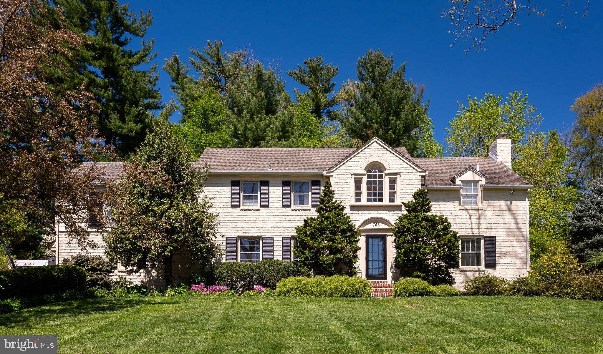Don’t let the address fool you. This Conestoga Road home sits far back off the main road down a long driveway on a private interior lot that backs to the prestigious Agnes Irwin School for Girls and the much-desired Browning Lane neighborhood. On the opposite side of the drive across Conestoga Road is the Boxwood Road neighborhood, which has many luxury homes and is a great place to take an evening stroll. 745 Conestoga Road is a lovely traditional expanded brick colonial-style home with a layout that will surprise you. The heart of the home is the spacious kitchen with high-end stainless appliances and abundant storage space. Opening to an oversized family room with a stately fireplace, the kitchen has a large island food prep workspace offering guests seating as they watch the host make a delicious meal come to life!  Walls of windows grace the family room, drawing in natural light and looking out onto the lush 1.4-acre lovingly kept backyard with a personal pool and spa. In addition to its captivating features, this residence boasts an in-ground pool, offering a refreshing retreat for relaxation and recreation right in your backyard. The in-law suite provides a private and comfortable space for guests or extended family, ensuring everyone feels at home. Its amenities and privacy make it the perfect addition to this impressive property. The laundry room is thoughtfully designed with shelving, closets, and cabinets, providing ample storage and organization for all your laundering needs. Additionally, the mudroom offers a convenient space to transition from outdoor activities to indoor comfort, keeping the rest of the home tidy and welcoming. For your furry friends, the dedicated doggie room with a shower and access to the fenced yard ensures your pets have space to stay clean and enjoy the outdoors. This thoughtful addition caters to the needs of both pets and their owners, creating a harmonious living environment for everyone in the household. If you work from home, a quiet, private office is tucked away on the main level with built-in bookcases and a powder room. Rest assured that with a whole house generator, you will be able to charge your phone and remain cozy in inclement weather! The classic living room with hardwood floors has a wood-burning fireplace and a mantel for fireside chats. A door in the living room opens to the backyard patio for extended living space while entertaining. Begin an evening sharing a meal with friends and family in the conventional dining room with a large picture window. The upstairs has three large bedrooms and three full bathrooms. The owner’s bedroom has a newly renovated, sumptuous bathroom with a stand-alone soaking tub, a large glass-enclosed shower, a double sink with quartz countertops, and a separate commode. Just outside the owner’s bedroom is an open area with a large Palladian window to serve as the sitting area for the owners. If all of this isn’t enough, there is a finished lower-level recreation room with flex space for a game room, exercise room, arts and crafts room, or whatever the new owner desires. The seamless end of elegance and functionality makes this an easy home to live in. Don't miss the opportunity to make this exquisite property your own. Experience luxury, comfort, and tranquility at 745 Conestoga Road. Schedule a showing today and envision the possibilities of calling this remarkable residence your new home. 745 Conestoga is situated in between bustling towns of Bryn Mawr and Wayne with access to trains to Philadelphia, a quick trip to the Blue Route entrance to get to the airport, quaint shops and highly rated restaurants, plus the top-rated Radnor School District, and several prestigious private schools. Showings are to begin on Friday, May 3.
