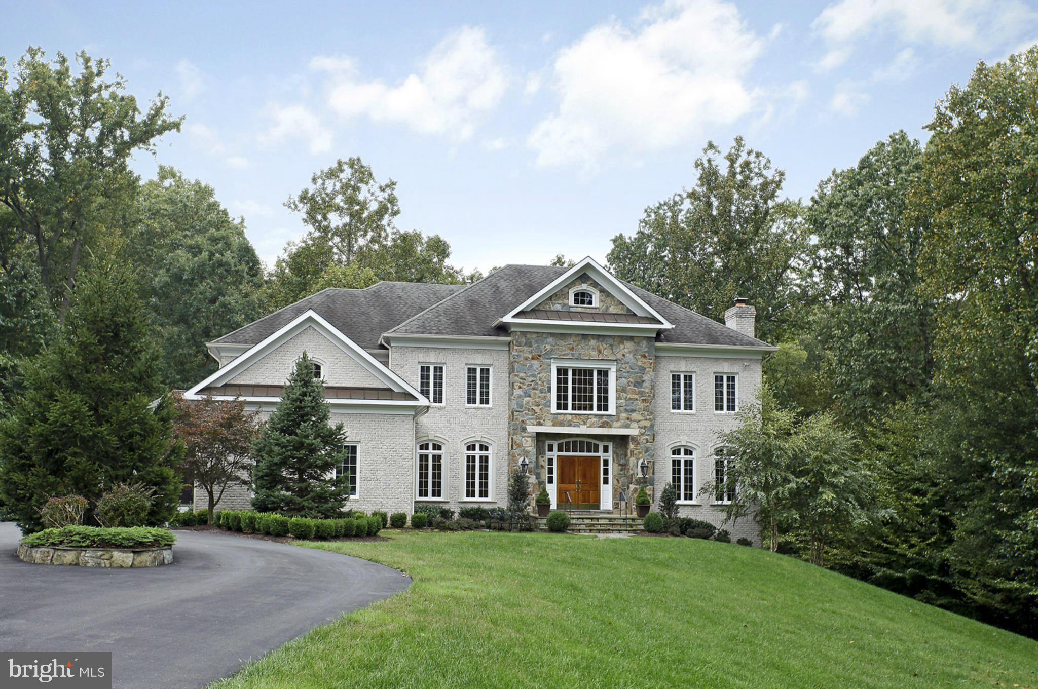 Absolute perfection on 3 levels! Too many upgrades to list! Beautiful high ceilings, exceptional, sunny, open flr plan, gorjus foyer w/sweeping staircase, renov. kitchen, renov.MBR. Ideal kitchen/FR w/handsome, stone gas FP. Sunrm + dynamite mahogany screen porch. Huge lwr lvl for casual entertaining. Picturesque 4.76 acs for nature lovers to enjoy. Private, wooded walking path to creek.Hurry Over