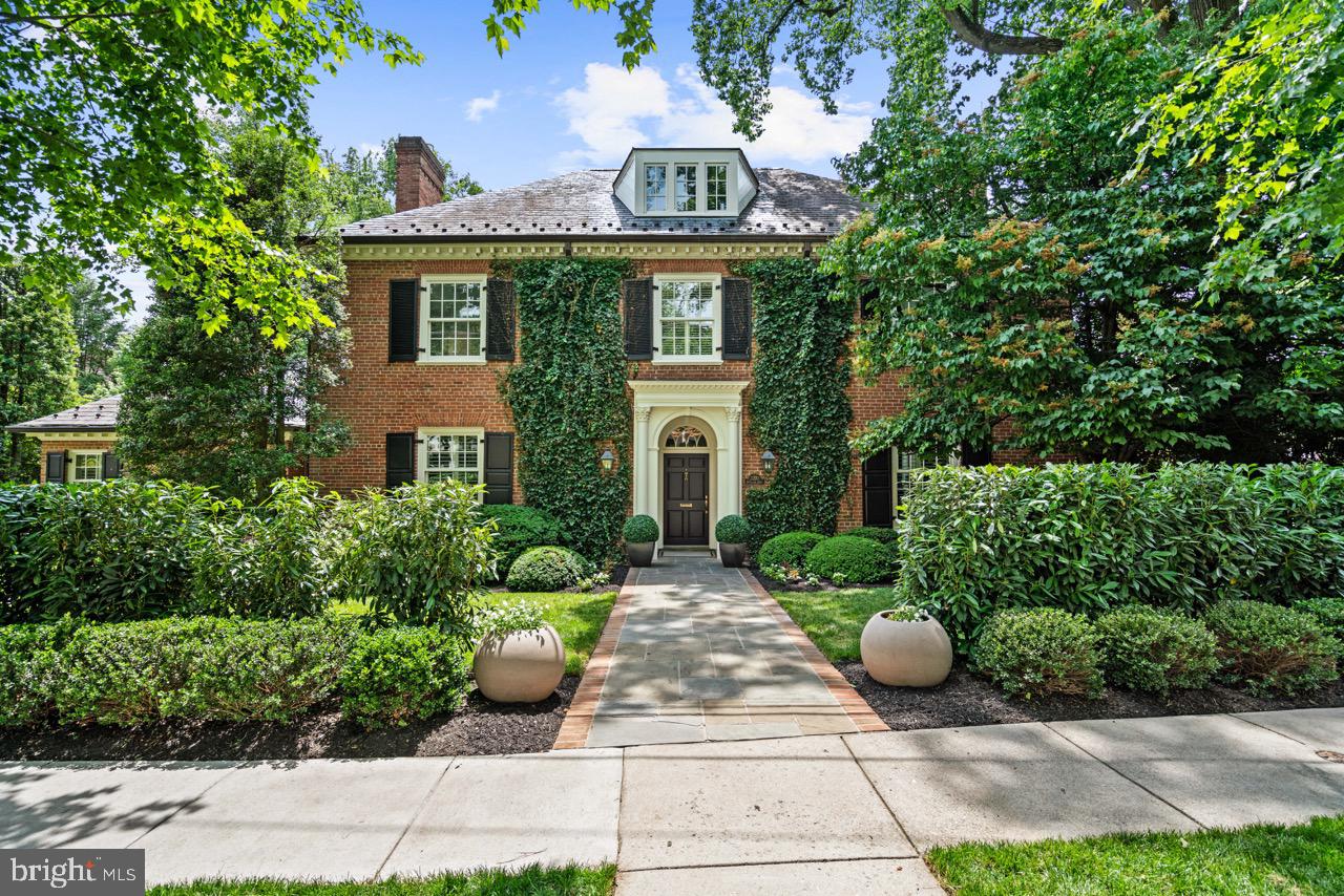 Set along a quiet, tree-lined street in Massachusetts Avenue Heights, this timeless Georgian Revival residence blends classic architecture with beautiful living spaces, a generous floor plan, and private outdoor amenities designed for both everyday living and entertaining.

The interior features a welcoming foyer with black-and-white marble flooring introduces the home's classic proportions, abundant natural light, and high ceilings. The main level offers a seamless balance of formal and elegant rooms. 

The second floor is anchored by a spacious primary suite featuring a walk-in closet and a large spa-inspired bath. Two additional bedrooms, each with an en-suite bath, provide comfortable accommodations, while a dedicated laundry room adds everyday convenience.

The third level offers two additional bedrooms, a full bath, and a sitting room ideally suited as a home office or library.

The finished lower level provides exceptional flexibility with a spacious office and television room that opens directly onto a covered terrace. A separate recreation room offers space for ping pong, exercise equipment, and abundant storage. A powder room, laundry area, and direct access to the attached two-car garage complete the level.

The exterior features a private backyard is centered around a swimming pool and spa with surrounding terrace space, creating an inviting setting for outdoor entertaining and relaxation. 
Ideally located just steps from Rock Creek Park, Connecticut and Wisconsin Avenue's shops and restaurants. 

Offering timeless architecture, generous living spaces, and a highly functional floor plan, the residence presents a rare opportunity to own a classic home in one of Washington's most established neighborhoods.
PRICE : 6.450.000