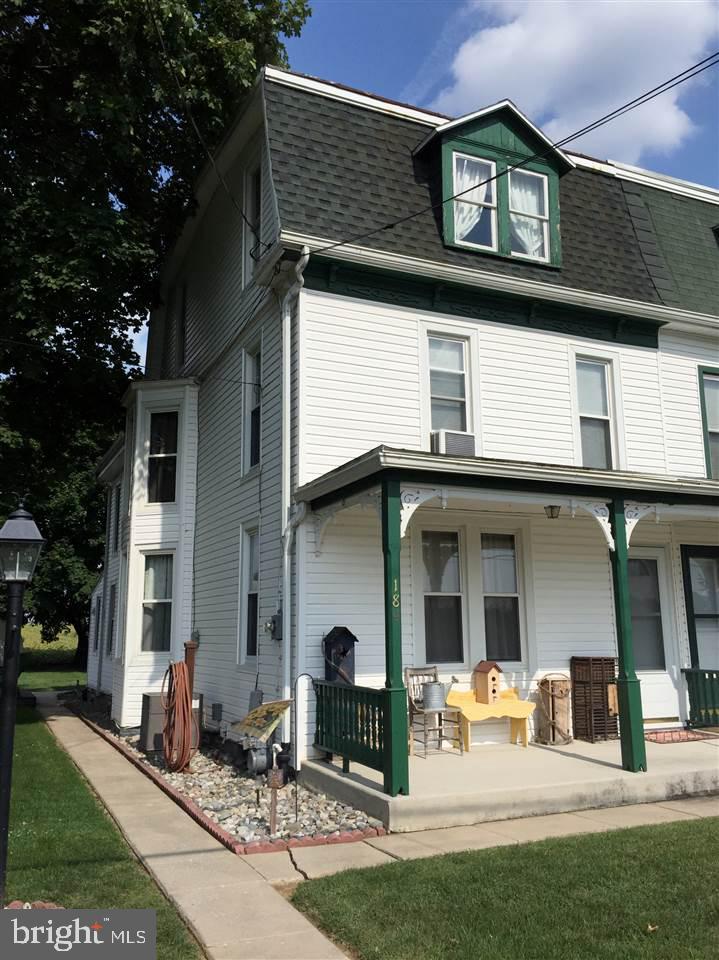 USDA (100%) financing available.  This 3 Br, 1.5 Ba, 2 Car garage home shows great!  With large kitchen, main level laundry, front porch, bay windows, ext shed, clothes line, awesome yard with deck, gas heat and central air, what more could you ask for?  Added bonus, no HOA to be worried with.  Seller is giving a free 1 yr home warranty.  Walking distance to the local golf course.  Better act fast!  Why rent when you can own?  Visit today!