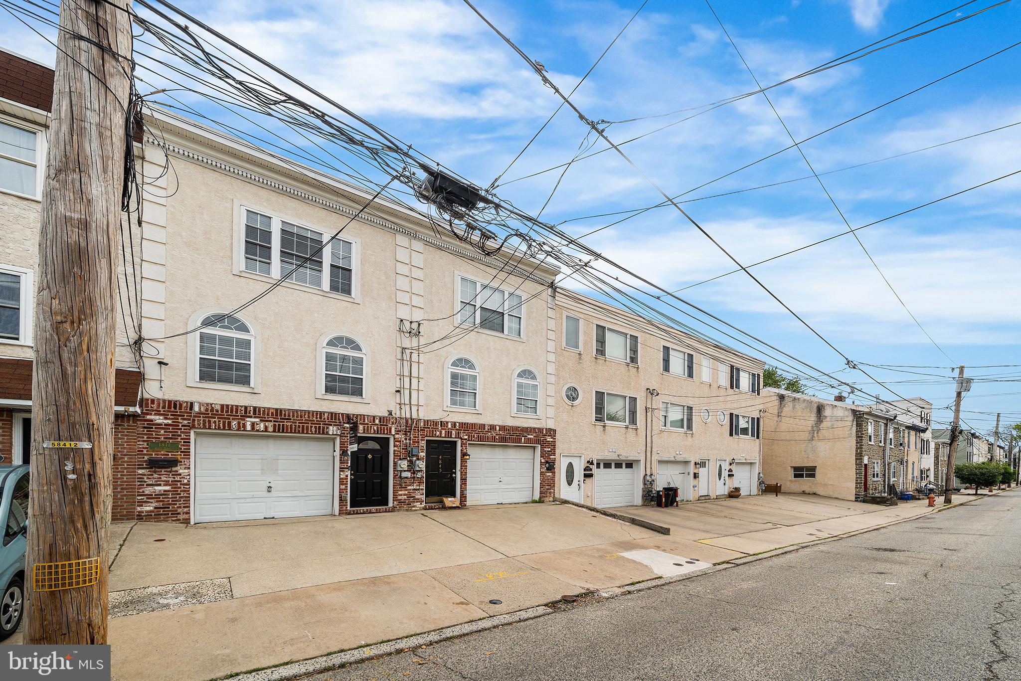 Welcome to this spacious and beautifully maintained townhome in the heart of Manayunk, just a stone’s throw from the train station, Main Street dining, shopping, and everything the neighborhood has to offer. Featuring 4 bedrooms, 2.5 bathrooms, an attached 1-car garage, plus additional driveway parking for 1–2 vehicles, this home offers the perfect blend of space, convenience, and outdoor living.
The entry level features a private bedroom, full bathroom, and laundry area — ideal for guests, a home office, gym, or multigenerational living. Upstairs on the main level, you’ll find an expansive living and dining area filled with natural light, along with a spacious kitchen offering ample cabinet space, gas cooking, and direct access to the rear deck and oversized backyard, a rare outdoor setup in Manayunk and perfect for entertaining, grilling, gardening, or relaxing outdoors. A convenient powder room completes this level.
The top floor features three generously sized bedrooms and a full hall bathroom, including a spacious primary bedroom with excellent closet space and abundant natural light.
With neutral finishes, a flexible floor plan, garage parking, and an unbeatable location close to regional rail and all of Main Street Manayunk’s restaurants, cafes, and nightlife, this move-in ready home is an incredible opportunity in one of Philadelphia’s most sought-after neighborhoods.
