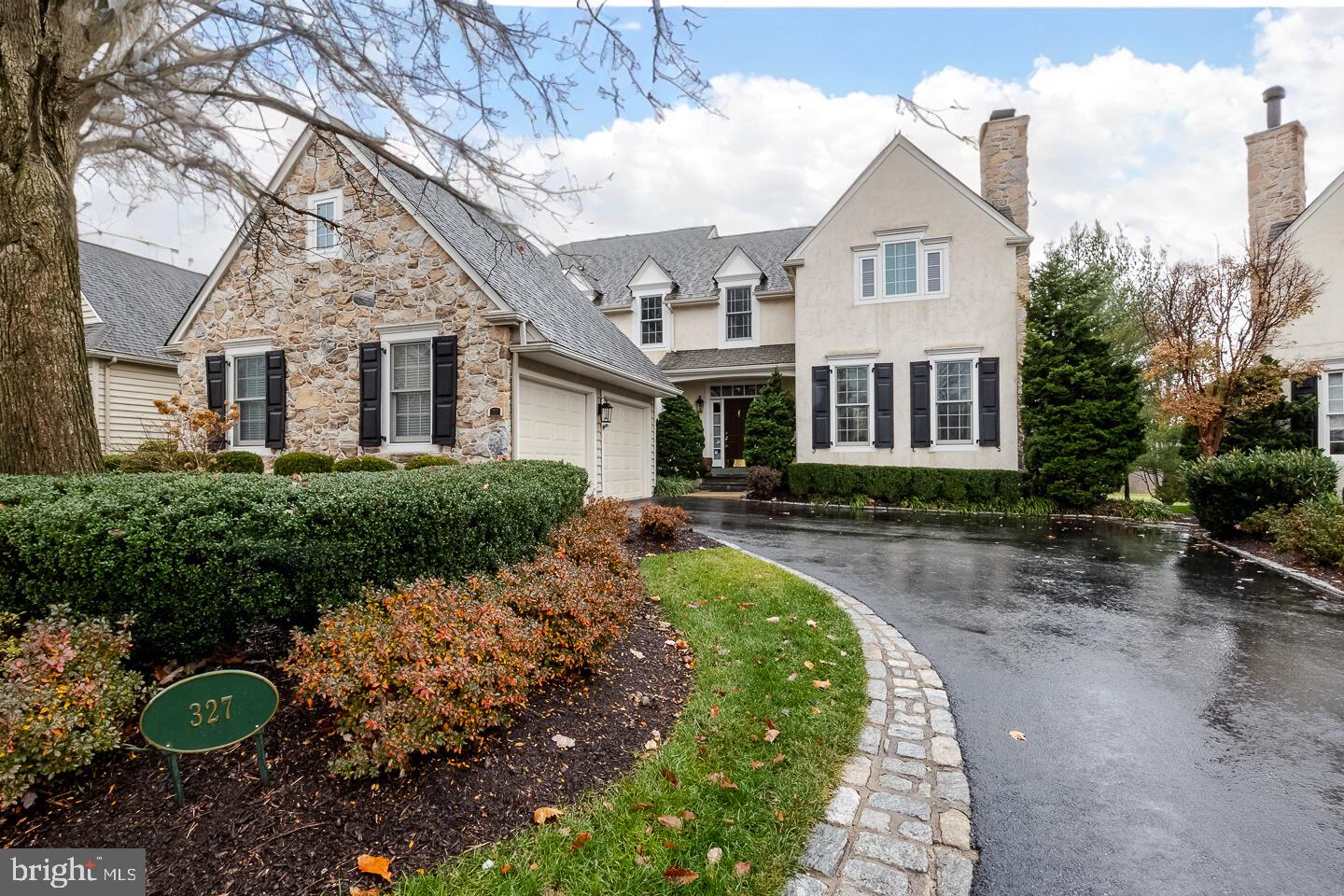 Come see the gorgeous golf course views at the prestigious Applebrook Golf Club! Welcome to 327 Applebrook Drive, a stunning 3-bedroom, 3.5-bathroom carriage home nestled in the prestigious Applebrook community in East Goshen Township. This exquisite property seamlessly blends luxury, comfort, and timeless design in an unparalleled location.   Step into the grand foyer, where you’re greeted by a sweeping staircase, crown molding, and gleaming hardwood floors bathed in natural light. The elegant front sitting room boasts a marble-surround fireplace accented by intricate floor-to-ceiling woodwork, creating a refined ambiance and class.  The mirrored wall adds a touch of class with a transom overhead window & glass pane door leading you to the study with built in rich cabinetry, recessed lighting. Hall bathroom just outside the study door for convenience with ornate wallpaper & elegant glass top and glass bowl vanity. The heart of the home is an open-concept living room, thoughtfully designed with recessed lighting, surround sound, and custom built-ins. Flush mount electrical is built into the rich hardwood flooring for ease of furniture and space.  French doors span the rear wall of the space with light and frame stunning outdoor views. The gourmet kitchen features a 6-burner gas stove, granite countertops, a spacious island with ornate pendant lighting, double ovens, a paneled Sub-Zero refrigerator. The integration of a secretaries desk creates a centralized place for paying bills, maintaining busy schedules and staying organized, while providing a great use of storage space. Enjoy meals in the sunlit breakfast room with panoramic golf course views. Flowing off of the kitchen is a convenient butler’s pantry to add to your entertaining needs and leads to your formal dining room with chair rail accents & crown molding. A large mudroom area off the entrance to the spacious 2-car garage offers ample storage and maintains you organization needs. Making your way up the staircase you will find a large functional landing with sitting space & shelving nooks for a private quiet space. The master suite is a sanctuary of luxury with tray ceilings, dual walk-in closets, and a spa-like ensuite with a soaking tub, tiled shower, and his-and-her vanities. Two additional bedrooms share a Jack-and-Jill bathroom with separate vanity areas and a skylight.  The finished basement is an entertainer’s paradise, complete with a wet bar, wine fridge, farmhouse sink, and open living space with built-ins. Additional features include a private home gym space, a fully tiled bathroom with walk-in tile shower featuring a stunning waterfall shower head, and an expansive laundry room with a folding and drying station. Outside, the slate patio with a stone wall and vine-covered pergola offers breathtaking year-round views of the golf course, perfect for relaxing or entertaining.  Ideally situated, this home provides easy access to Malvern’s charming shops and restaurants, East Goshen Park, Willisbrook Nature Preserves, and Philadelphia’s Main Line.  Experience unparalleled luxury and convenience—schedule your private tour today.