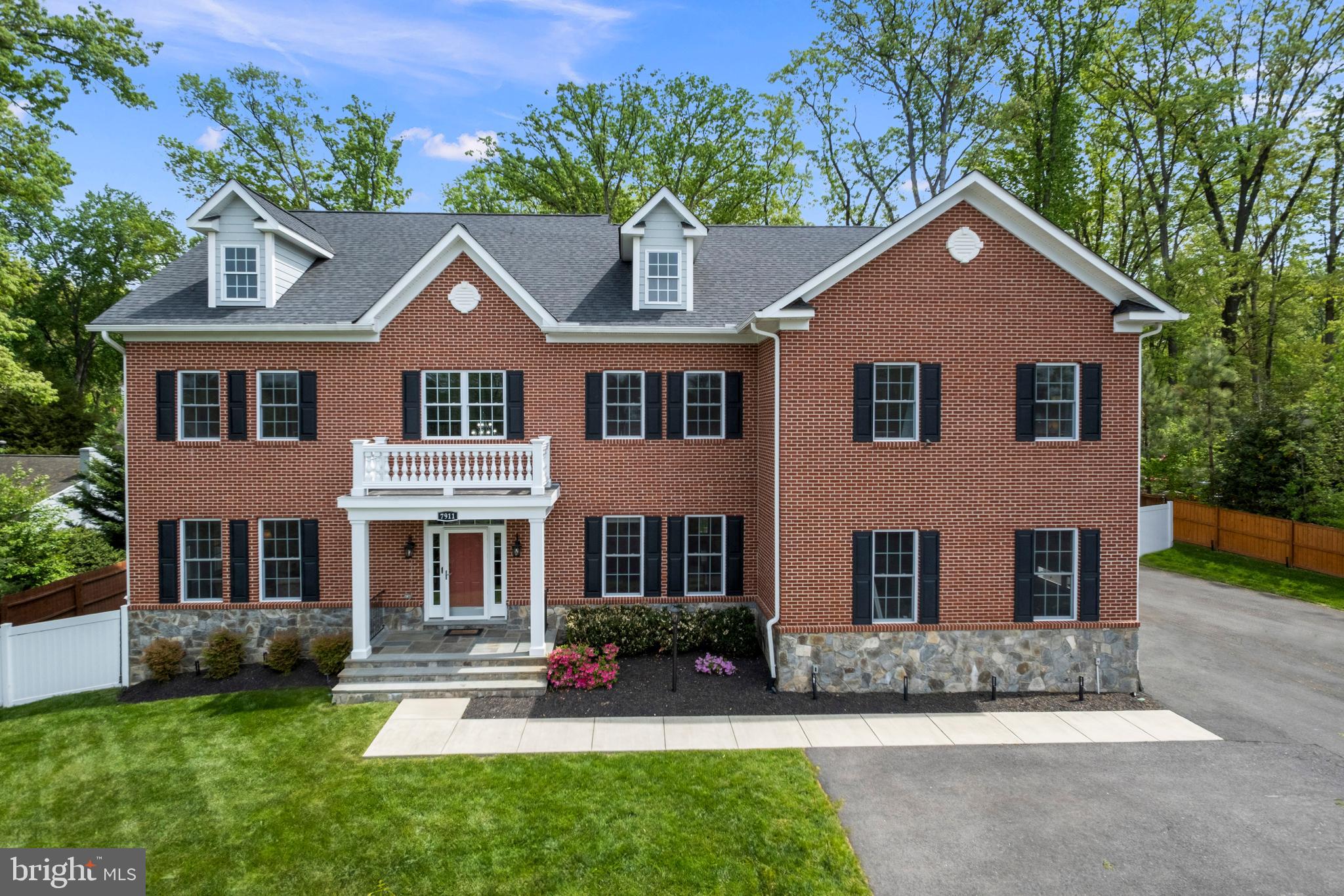 Open Sunday (10/5) from 1-4.  You must see it to believe it! This stunning home is a perfect 10 and has it all—located in one of the most coveted school districts, it combines luxury, space, and convenience in one unbeatable package. Every spacious bedroom (potentially 8 depending on use of space) comes with its own private bath, including a versatile first-floor office/guest suite with full bath—perfect for visitors or multigenerational living. Step outside to your own private oasis with a fully fenced backyard, extensive hardscaping with stone walls and flagstone patio — ideal for entertaining, relaxing, or letting kids and pets roam free on this lush, estate-like .41 acre lot. With the convenient Hollin Hall shops just across the street offering a grocery, pharmacy, specialty shops and delicious dining, everything you need is right at your doorstep.
This unique property is surrounded by the tranquil community of Tauxemont/Fort Hunt and has an abundance of amenities that enhance this location, convenient to the scenic George Washington Parkway, Route 1 and I-495.   Outdoor enthusiasts will love the many local parks including Fort Hunt, Huntley Meadows offering over 1,500 acres of beauty, and Dyke Marsh Wildlife Preserve offering 485 acres of tidal wetlands.  If historical, cultural, or nightlife pursuits are what you seek, Mount Vernon, Old Town Alexandria, National Harbor, and Washington, DC, are all just a short drive away.
Tauxemont, “the jewel of the Mount Vernon area,” offers a unique character with a natural, wooded environment and pure water from an aquifer-sourced community well maintained by the Tauxemont Community Association (TCA). Residents also enjoy parks, nature paths, and tennis courts.  Annual fee for water in 2025-2026 is $1,050.  TCA is a corporation - not a HOA - and formed to serve lot owners in the Tauxemont subdivision and each is a stockholder in the association.  See Tauxemont website for add'l info on the community/services.
All systems and appliances are less than 5 years old, plus the current owners invested over $150,000 in upgrades and improvements, including flagstone patio & stairs w/wrought iron railing, flagstone retaining walls, underground drainage system, landscaping design and renovation including tree planting & removal, privacy fencing to fully enclose the yard and utilities, Suncast Storage Shed on concrete foundation, paved parking area in front and recently resealed entire asphalt drive and parking area.  
On the interior, improvements include AprilAire Steam Humidifier and ActiveTek Ozone-Free Air Scrubbers for HVAC Systems, additional washer/dryer in LL, KitchenAid dishwasher, built-in glass front bookcases throughout, owners’ suite closet shelving & drawers, window shades throughout, stairway & upper landing carpet, multiple Larson Platinum Secure storm doors, and much more.  See complete list in Docs. 
This gorgeous home has hardwood floors & recessed lights thru out, formal living & dining rooms and casual spaces across the light-filled back overlooking  serene back yard.  A gourmet kitchen (GE Monogram),  breakfast room, and family room with coffered ceiling, along with a versatile main level BR with en suite bath and powder room, walk-in pantry, mud-room with built-in cubbies, and butler’s hall/bar finish off main level.  
Upper level hosts 5 generous sized BR’s each with private bath and large closet, plus a laundry room, and gorgeous landing with custom quartz-topped wet bar, wine chiller/fridge and cabinets.  
Quality craftsmanship continues on LL with LVP flooring, recessed lighting, and contemporary gas fireplace. The expansive Rec Room has fully equipped wet bar topped with quartz & custom tile. 2 more BR’s w/en suite baths, second washer/dryer, utility room  w/extra storage, and stairs to back yard finish the LL.
This truly luxurious home with such an amenity-filled location is rare! Welcome Home!