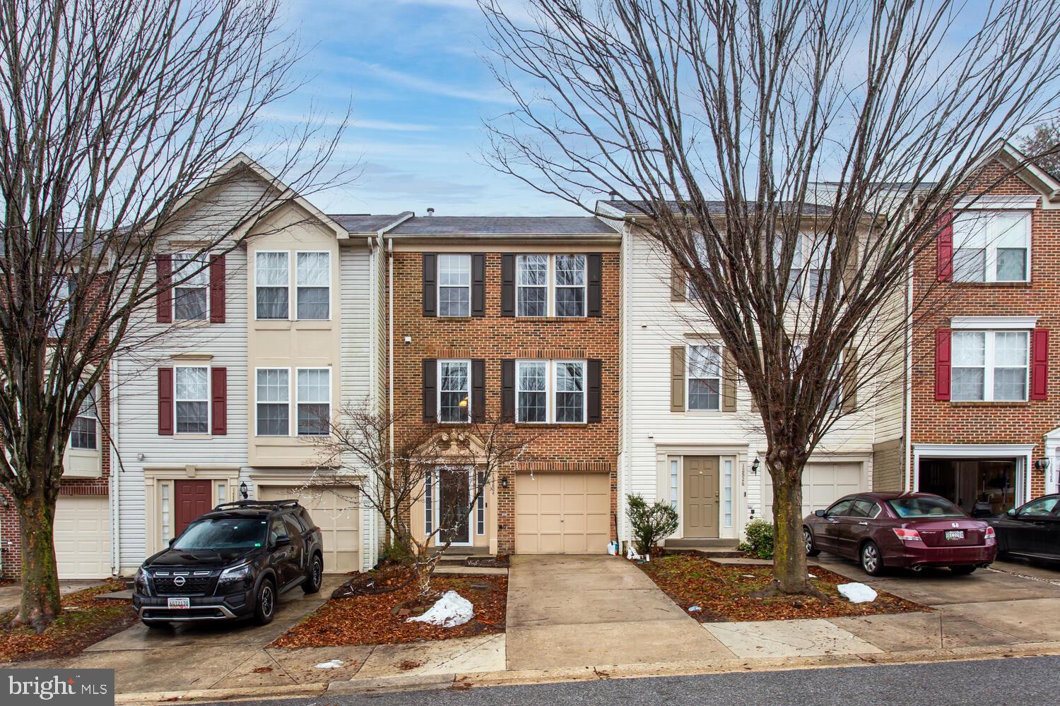 Welcome to Marlton Town Center, a convenient community located close to local schools, shopping, dining, and major routes with easy access to Route 301. This well-maintained townhome offers a 1-car garage, 3 bedrooms, and 2.5 bathrooms with thoughtful updates throughout. The main and lower levels feature an inviting foyer with LVP flooring and two closets for excellent storage, a spacious family/recreation room with new carpet—ideal for a media room, playroom, office, or gym—plus a laundry area with washer and dryer, a new hot water heater, and direct garage access. The second level is designed for living and entertaining with a large open-concept living room, a semi-updated eat-in kitchen with a beautiful backsplash, stainless steel appliances, and casual dining space, a bright sunroom that fills the area with natural light, and access to a large deck (only about 1 year old), perfect for grilling, gatherings, or relaxing outdoors. Upstairs, you’ll find three bedrooms, including a primary suite retreat with high ceilings, two walk-in closets, and an upgraded spa-like bathroom with steam shower and deep sunken tub, along with two additional bedrooms and a full hall bath. Notable updates and features include LVP flooring throughout, new carpet in the basement, a new hot water heater, new blinds, a newer deck, and updated flooring and finishes. With its functional layout, abundant natural light, and numerous updates, this Marlton Town Center townhome offers comfort, style, and convenience—come see all it has to offer for yourself!