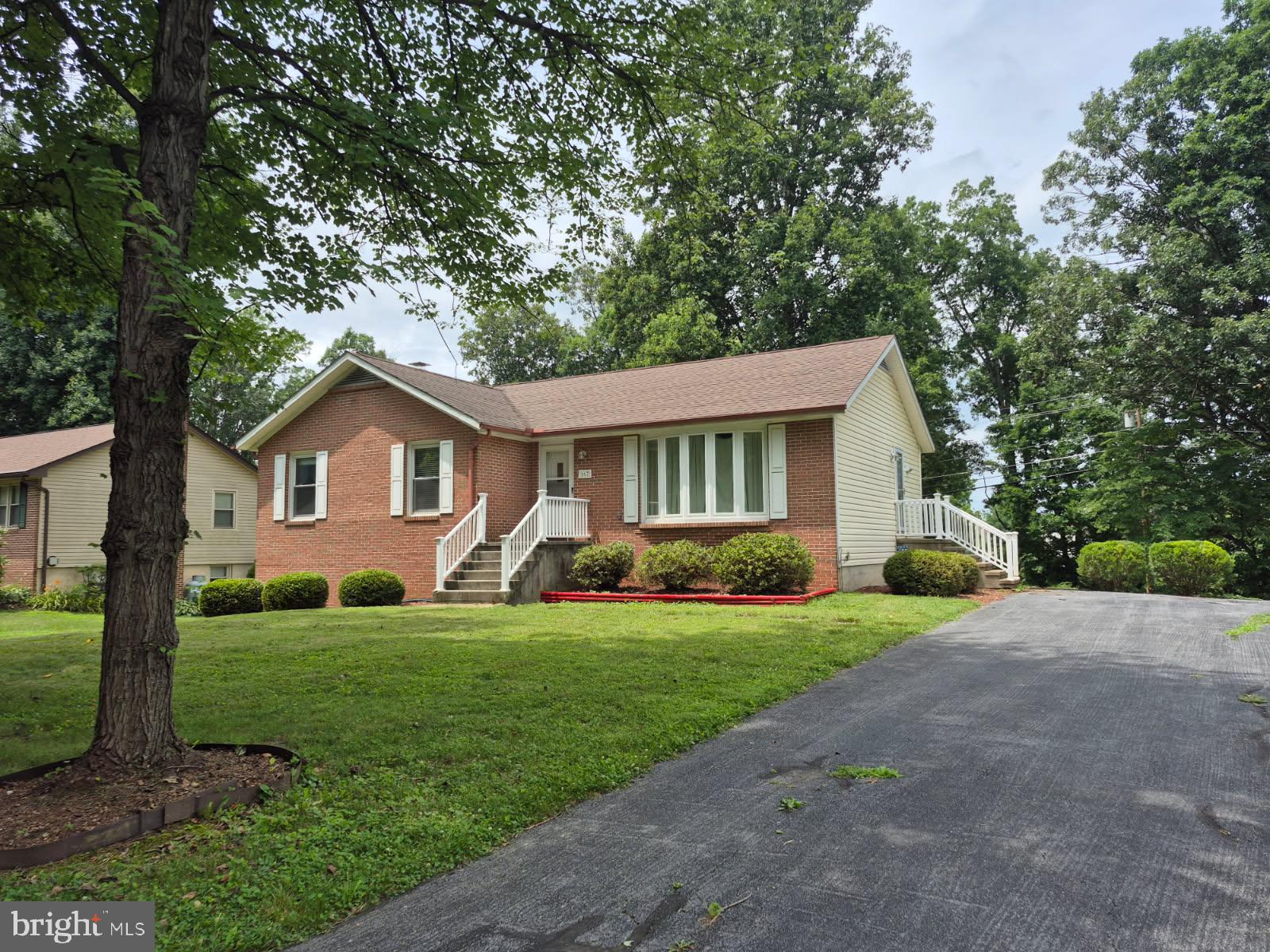 Sought after established neighborhood of Tuscawilla Hills. Rear yard backs to Locust Hill Golf Course. Brick front Rancher solidly constructed by original developer A.G. Hooper, Jr.  Mature trees, landscaping. Paved driveway.  Spacious Formal Living Room, with large Bay Window and German Custom Hutch. Kitchen w/ counter island adjacent to Dining Room. Primary bedroom with bathroom. Two additional bedrooms.  Large basement family room w/ large storage closet, built in shelving, sliding glass doors to rear yard.  600 sq. feet of basement storage with utility shelving.