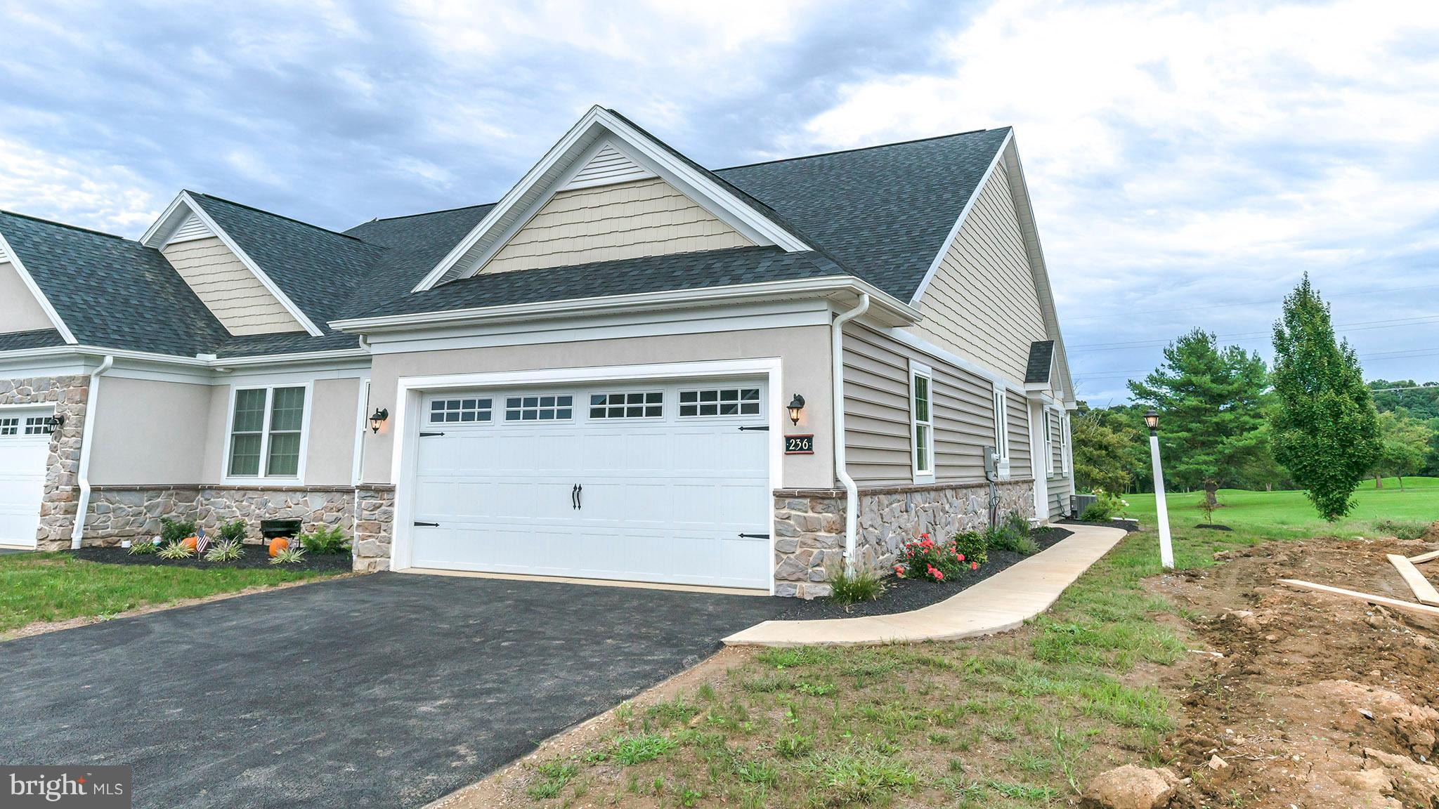 Popular Els 1 story floor plan in the Crossgates Community. Open floor plan with side entry. Spacious white kitchen with granite countertops, stone backsplash, stainless steel appliances, island, large pantry, open to the dining area and great room. Large first floor master suite with his & hers closets, master bathroom with comfort height vanity tops. Convenient 1st floor laundry room with sink, additional front bedroom or office with a full bathroom. Large unfinished basement with superior walls, perfect open slate to finish however you would like. Home overlooks the  8th fairway of the golf course. Enjoy the low maintenance living.