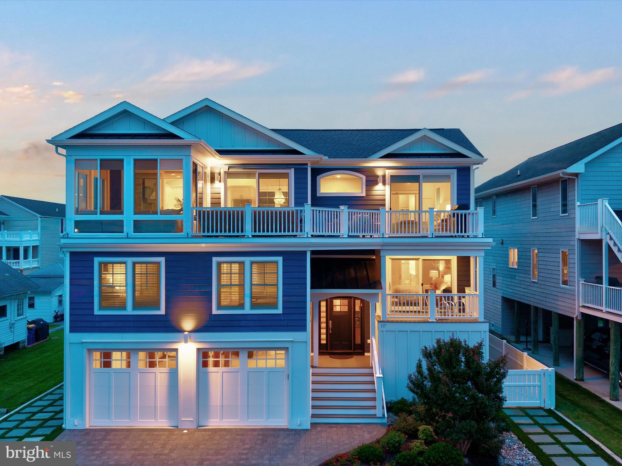 Experience Coastal Luxury in the Heart of Bethany Beach

Step into the perfect blend of beachside charm and modern elegance with this stunning  five-bedroom, four-and-a-half-bath home, ideally located just steps from both the sand and the heart of town. Designed with a reverse floor plan, the main living areas are thoughtfully placed on the top floor to capture beautiful views and natural light. A private elevator ensures effortless access from the ground level to the bedroom floor and up to the open-concept main living space. Soaring cathedral ceilings create an airy ambiance, while the gourmet kitchen flows seamlessly into the spacious dining and living areas.
This home is rich with upscale features, including:

Custom tilework and shiplap accents

Hardwood floors and a gas fireplace

Conditioned sunroom and multiple decks for outdoor living

Built-in beverage centers, central vacuum, and security system

Ample storage, paver driveway, and outdoor shower

Perfect for hosting guests or generating strong rental income, this home offers both comfort and convenience. Park your car and forget about it—you’re within walking distance to everything Bethany Beach has to offer.

A must-see property for anyone seeking coastal living at its finest.