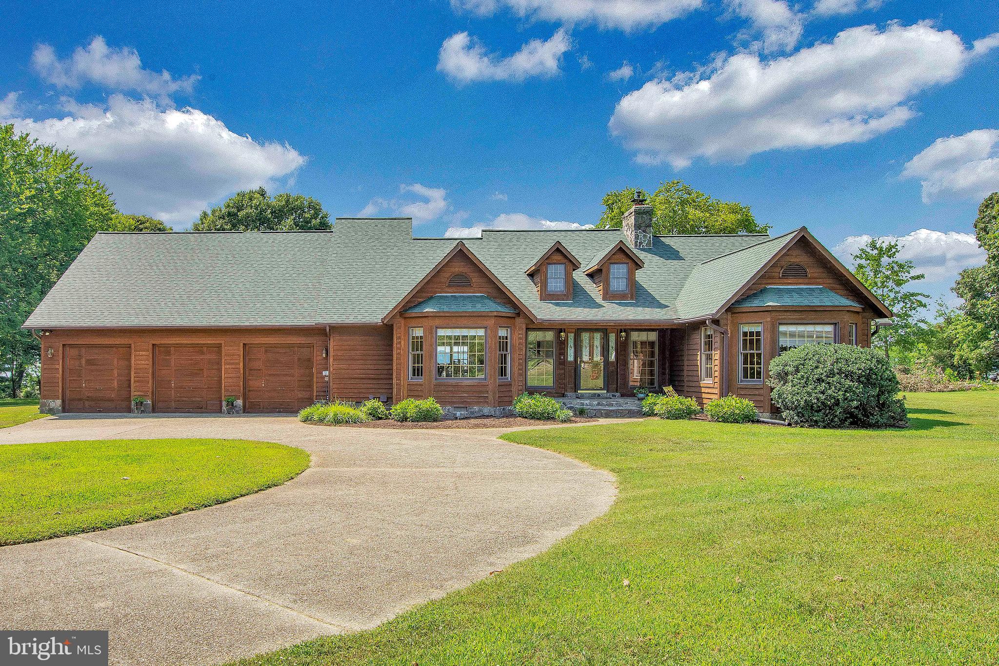 One of a kind! Over 200' of unobstructed Patuxent River Waterfront with an established seawall and riprap! 14 Cars worth of conditioned garage space! 2.9 wide open Acres! Main house is a 3 bedroom 2.5 bathroom rambler boasting a large master bedroom with great views, a built in 4 season hot tub, separate bar area located off the family room, a loft/office area, and a fully conditioned attached 3 car garage! Detached Garage w/ 11 car spaces created via 5 lifts with an attached 2 bed, 2 bath apartment & a deck! Apartment can be separated into a 1 bedroom 1 bathroom leaving a huge rec space with its own private bath. The very long 6' wide pier has a large covered slip with a boat lift, a second large slip, and second story party deck w/ a covered bar area below. This home is a one of a kind gem that woukd be extremely hard to replicate. If you like your toys, this is the home for you!!