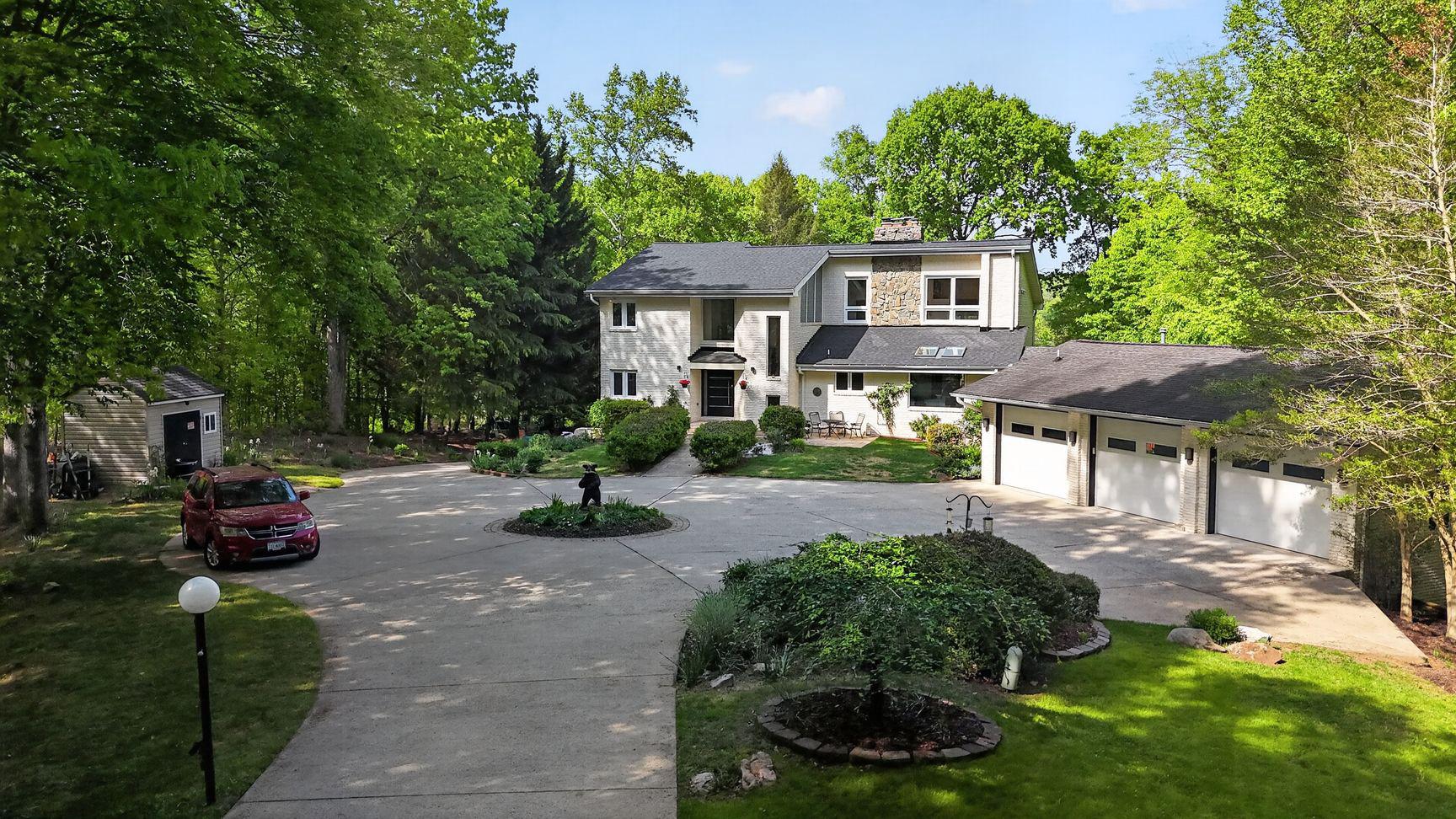 A one-of-a-kind TROPHY PROPERTY: A sprawling WATERFRONT contemporary estate with 150+ feet of water frontage on the Occoquan Reservoir.  Exceptionally private with a long driveway and a private peninsula with water surrounding the property on 3 sides.  Tremendous, sweeping WATERFRONT VIEWS with gazebo and private dock.  The contemporary home features a huge great room, dining room and study with water views.  Amazing gourmet kitchen with vaulted ceiling, contemporary cabinets, high-end appliances, and huge windows.  Upgraded European baths with designer tile.  Massive primary suite with balcony, steam shower, and huge closets.  Decks, patios, and an In-ground pool overlooking the water.  3 car garage with separate in-law suite underneath.  Big lower level with bar, theatre room, and office.