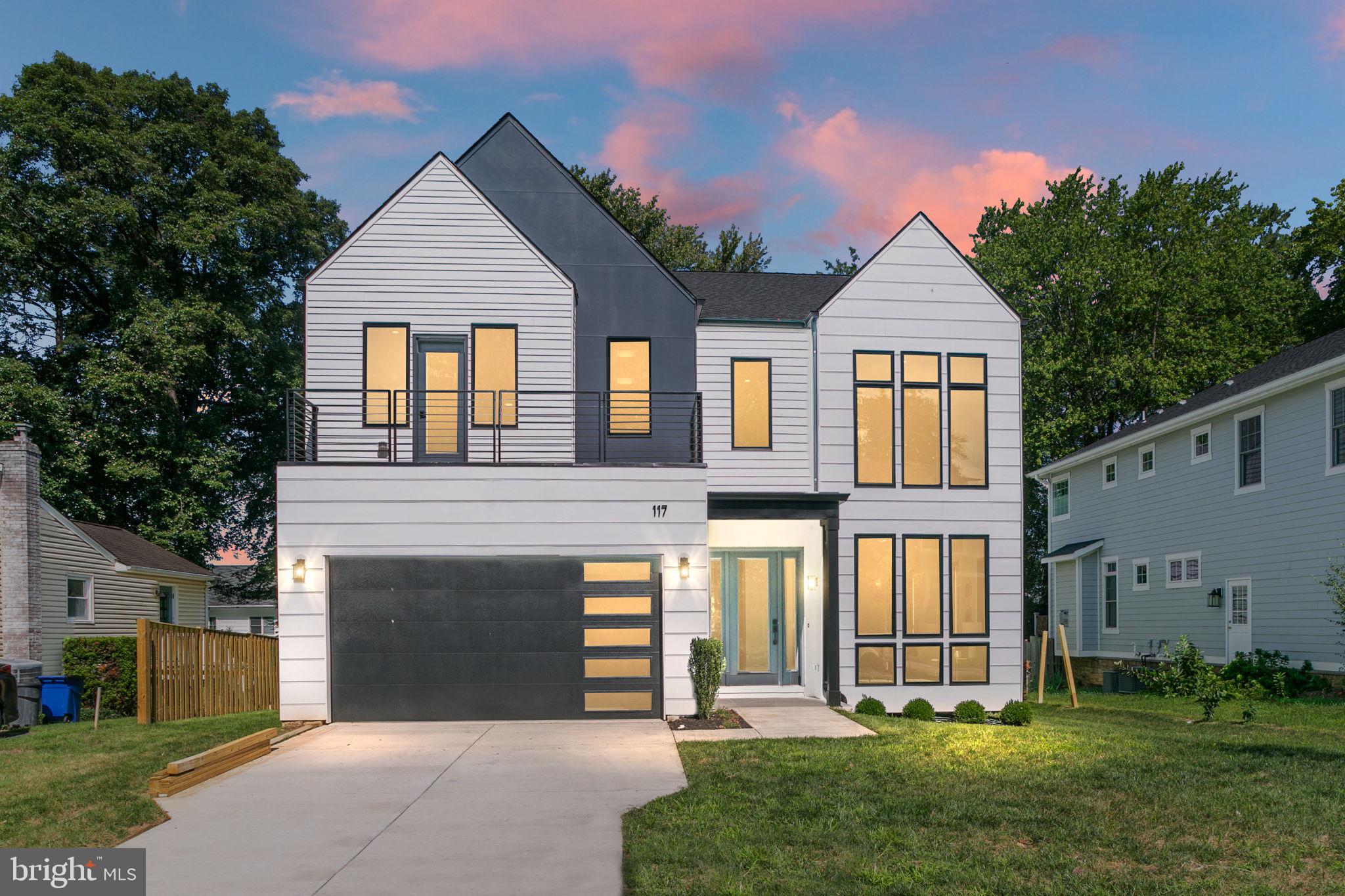 REDUCED. CELEBRATE THE HOLIDAYS IN THIS GORGEOUS NEW CONSTRUCTION.  Designed with  4 living levels  featuring a  Gourmet kitchen with wet bar in Butler's pantry, oversized island and quartz countertops.  Stunning white oak floors throughout home.  Fabulous floor plan (see documents) with family room and kitchen adjacent and walk-out to the deck and lovely  treed fully fenced backyard.  En-suite bathrooms to all 5 bedrooms.  Bonus room with full bath on main level.  Primary bedroom allows for spacious sitting area with a Juliette balcony overlooking the rear grounds. The lower level is also exceptional with a  gym, media room and wet bar with beverage refrigerator and a walk-up to the rear of the property.
Large picture windows throughout this sun filled home.  Truly a wonderful place to live and to entertain.
The location is amazing. Located in the heart of lovely Vienna and walking distance to the town and community center.  Only a few blocks to Whole Foods and other shopping.  Minutes to Tysons Corner and at least 3 METRO stops!