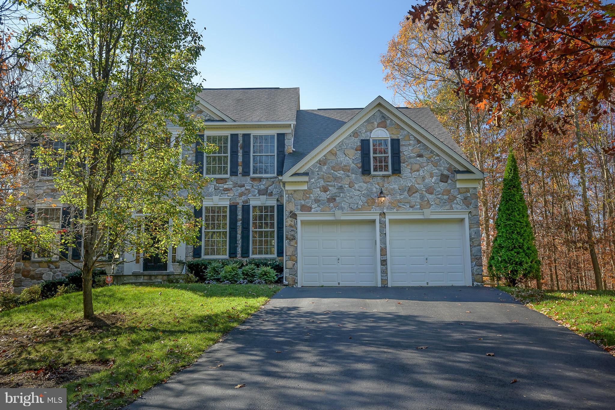 Beautiful & spacious, 5BR colonial w/ gourmet kitchen! Granite counters, huge island, gas cooktop, double oven & tiled backsplash. Hardwood floors & ceramic tile throughout main level.  4BR on upper level & 1BR on lower level. Basement rec room has cinema projector w/ screen & built-in bar.  Private lot backs to trees. Backyard play structure, firepit & hot tub. Move-in ready & Broadneck schools!