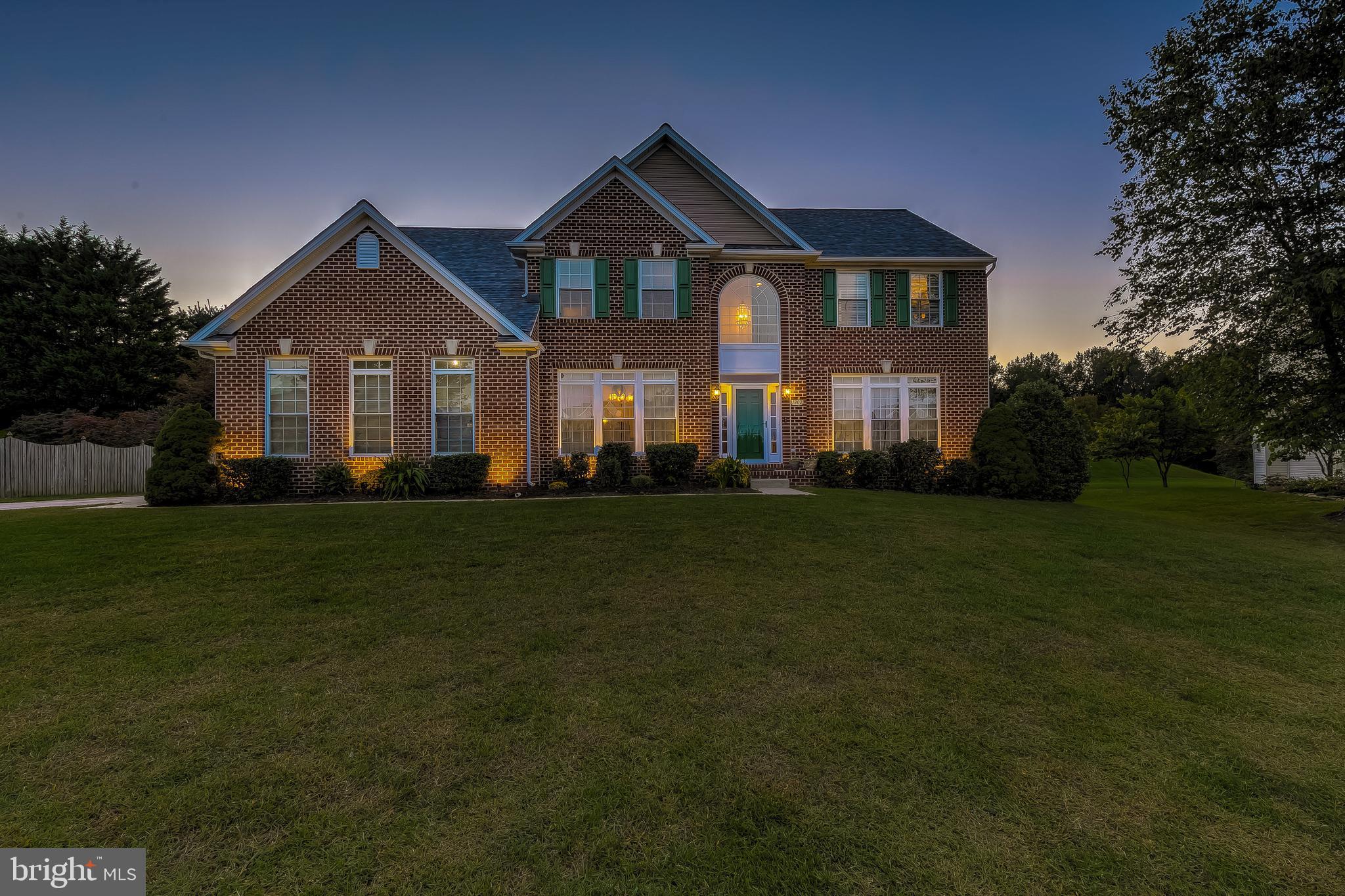 Over 6000 square feet of finished living space in the sought after Forest Lakes community on a quiet cul de sac.   This beautiful all brick home features a side entry garage, BRAND NEW ARCHITECTURAL SHINGLE ROOF & 24X14 STAMPED CONCRETE PATIO.   Fresh landscaping throughout the exterior with 110' stone retaining wall & full landscape lighting package.  Hardwood floors welcome you through the two story foyer into a wide open floor plan complete with large living room, dining room, private office, full sized laundry room, and two-story foyer.  The kitchen boasts all new black stainless appliances.  There is a massive morning room off the kitchen which leads you to your brand new stamped concrete patio. The morning room bump out extends to the basement and upper level.   Upstairs features 4 bedrooms and 2 full bathrooms.   The owners suite is HUGE complete with 7 windows, a deluxe owners bathroom with 2 vanities, separate tub and shower and a sizeable walk in closet.  The basement is an entertainers dream with a 5th bedroom and 3rd full bathroom.   Coffered ceilings, custom built bar, gas fireplace, surround sound, tons of storage & much more!