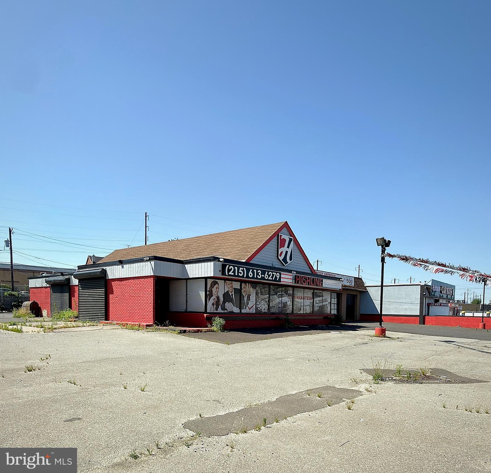 Rare Commercial Opportunity! Exceptional 6,335± sq. ft. commercial building located in a high-visibility, high-traffic location, ideal for an auto dealership, auto body shop, repair facility, detail center, fleet operation, or a variety of other commercial uses. The facility features over 3,000± sq. ft. of professional office and showroom space,  2 private offices, storage and 2  restrooms, creating a welcoming environment for customers and staff. In addition, the property offers more than 3,335±  sq. ft. dedicated to auto body service, and detail space, providing ample room for productivity and workflow. The expansive service area includes 8  10ft  drive-through bay doors, impressive 13.5 feet ceiling heights, and 3  lifts, making it well-equipped for automotive service and repair needs. Additional highlights include multiple work and storage areas, excellent layout flexibility, and room to customize for your business needs. 

Situated on approximately 0.6 acres, this gated and secure property provides parking capacity for up to 120 vehicles, offering plenty of space for inventory, customer parking, or fleet storage. With outstanding street visibility, easy accessibility to I-95 and Route 1, and endless business potential, this property is a rare opportunity in a prime commercial corridor. Property is also for lease MLS# PAPH2627376