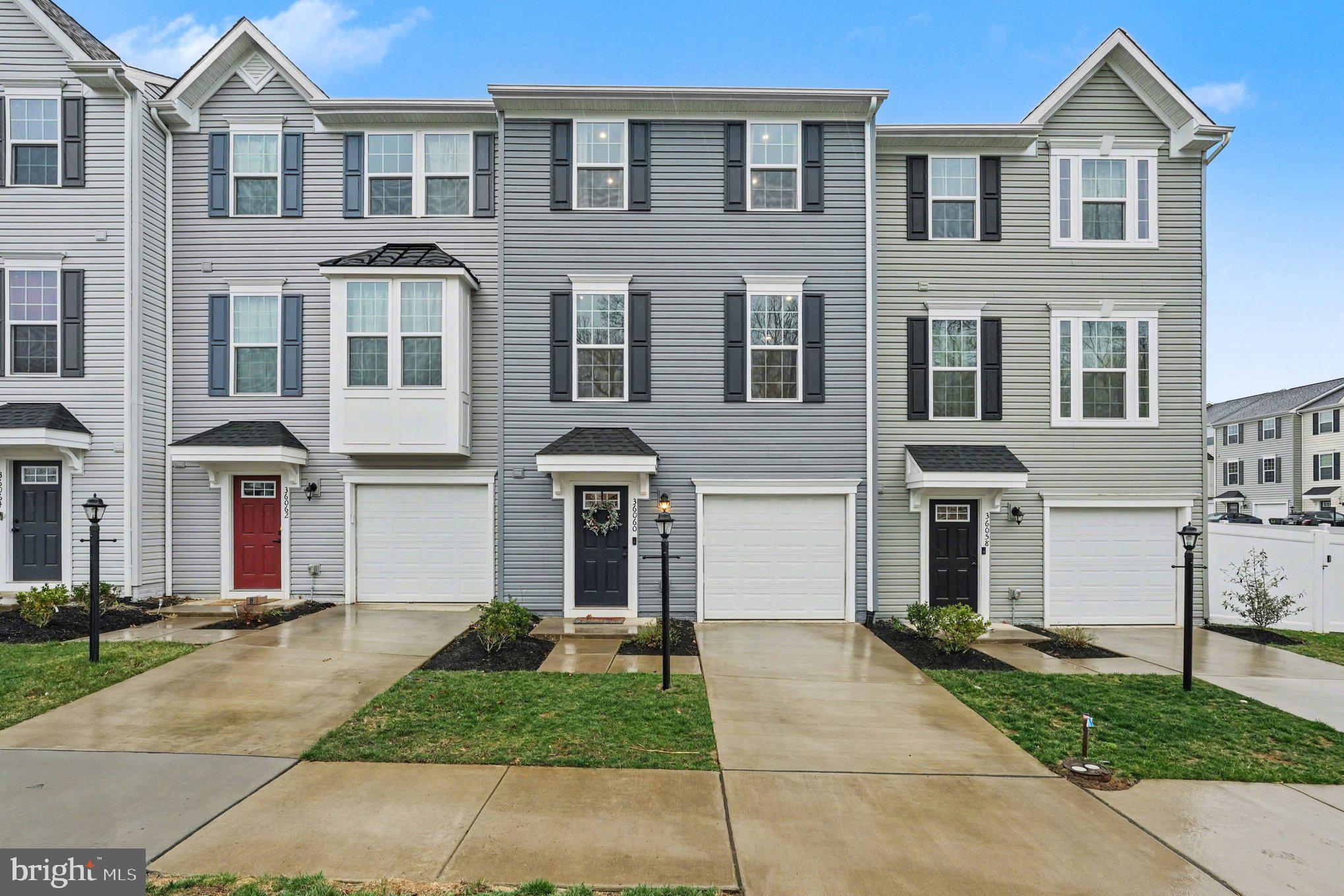 Built in 2023 and meticulously maintained, this well-appointed townhome offers modern finishes, flexible living space, and convenient access to everyday amenities. The entry level features interior access to the garage and a finished recreation room with a half bath, providing versatile space that may serve as a home office, sitting area, workout space, or additional living area depending on your needs.

The main level offers an open-concept layout designed for comfortable daily living and easy flow between spaces. The kitchen is equipped with 42-inch cabinetry with trim, recessed lighting, and upgraded luxury vinyl plank flooring, creating a clean and functional central gathering space. The adjoining dining and living areas provide an open setting suitable for a variety of furniture arrangements and uses.

Upstairs, the bedroom level includes three bedrooms and the convenience of an upper-level laundry area with washer and dryer included. The primary suite offers a spacious bedroom, ample closet space, and a private bath.

Outdoor features include a fully fenced rear yard and a large decorative concrete patio, offering additional usable space for outdoor seating, dining, or recreation.

Community amenities include a pool, clubhouse, walking trails, and tot lot. Conveniently located in Locust Grove, this home offers access to nearby shopping, dining, and commuter routes, with proximity to Culpeper, Fredericksburg, and I-95.

A great opportunity to own a nearly new home with modern finishes, flexible living areas, and community amenities.