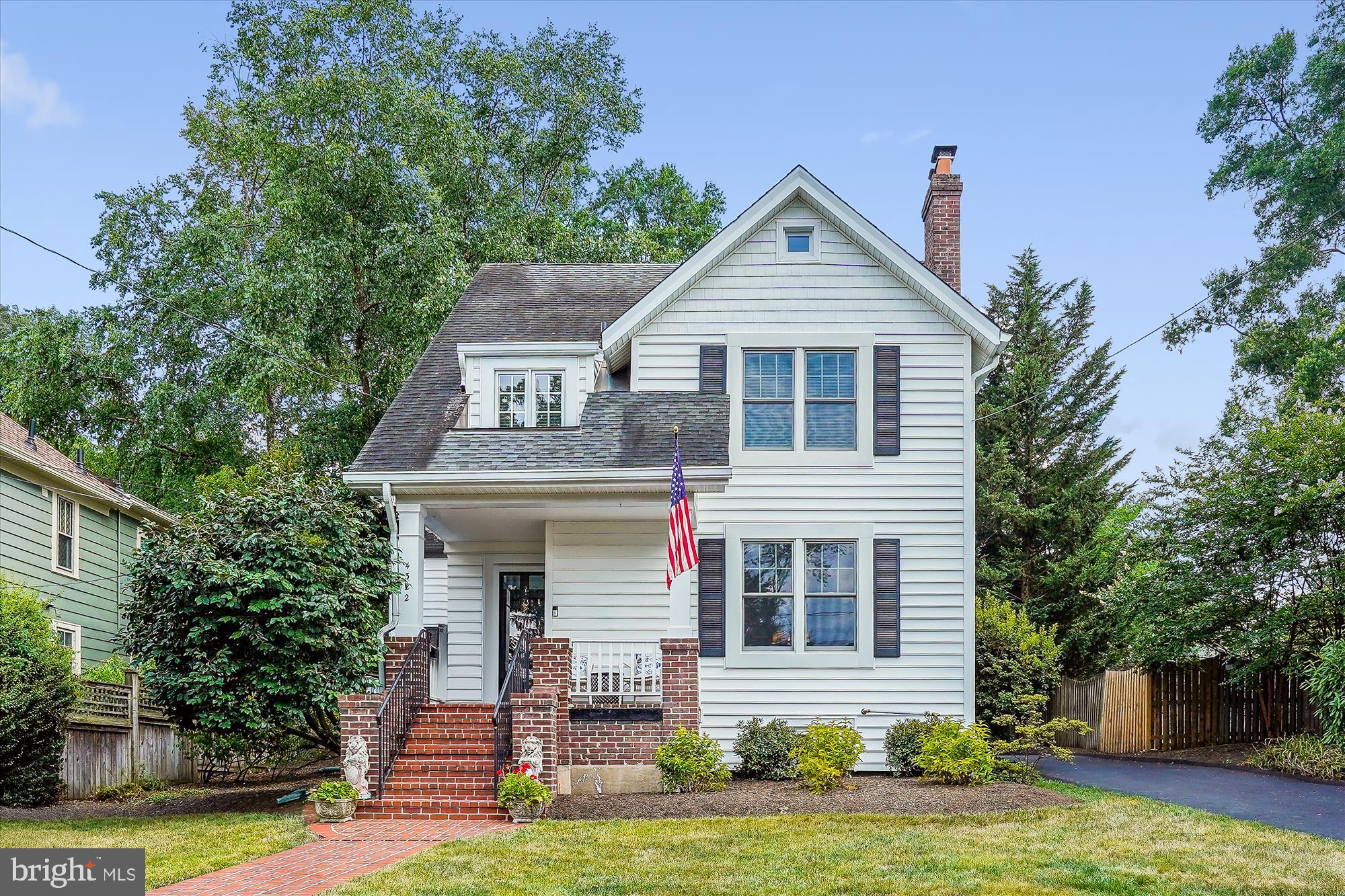 Experience the allure of this charming, expanded Colonial nestled in the coveted, family-friendly Waverly Hills neighborhood - mere steps from Ballston Metro, Ballston Quarter and the quaint Lee Heights Shopping Center. This 4-bedroom, 2 full / 2 half bath home boasts features including two staircases, two wood-burning fireplaces, recently installed Anderson windows and doors, refreshed front room hardwood floors, detached garage and full length private driveway.

With a welcoming front porch overlooking the peaceful street, step into this home's foyer that flows into the open, sunlit living room where you're greeted by the first of two cozy wood-burning fireplaces. Down the hall, the galley kitchen opens to a spacious, naturally lit eat-in area with a refurbished butcher block wraparound counter, built-in wine rack, and family room, complete with the second larger, stone-masoned wood-burning fireplace. In between the family and living rooms, enjoy a dining area that is perfect for both formal and informal gatherings, and even the occasional family holiday feast.

The main level also offers a large pantry, convenient mudroom with direct outdoor access, an additional refrigerator and an inviting powder room half bath. Outside the main double doors by Anderson, a slate patio awaits for outdoor entertaining opportunities, nestled between the flat backyard and detached garage bookending the expanded driveway. There is also a natural gas line from the house that can seamlessly connect to your gas grill (no need for propane tanks!).

Upstairs, the expanded primary bedroom includes an ensuite bathroom with a jacuzzi tub and separate, large standing shower. The fully carpeted suite also includes a large walk-in closet and plenty of natural light. Two additional naturally-lit bedrooms with hardwood floors, plenty of closet space, a recently renovated full bath, and a study/den/flex space complete the third level. The expanded fourth level provides versatility as a bedroom, office, playroom or gym along with ample walk-in storage space.

The basement level features a half bath, additional living space for activities, a separate room for washer/dryer, and plenty of extra storage.

This stellar property boasts easy access to major highways and is conveniently located minutes from airports, public transportation, the Pentagon, downtown Washington DC, Tyson's Corner, Virginia Hospital Center, Marymount University, and George Mason Law School. Enjoy easy access to restaurants, coffee shops, parks, playgrounds, and scenic walking and biking trails.

School pyramid includes Glebe Elementary, Hamm Middle School, and Washington Liberty High School. There are also several private schools within minutes of the property, one even within walking distance.

Don’t miss your chance to own this exceptional home in a prime Arlington location. Schedule your tour today!