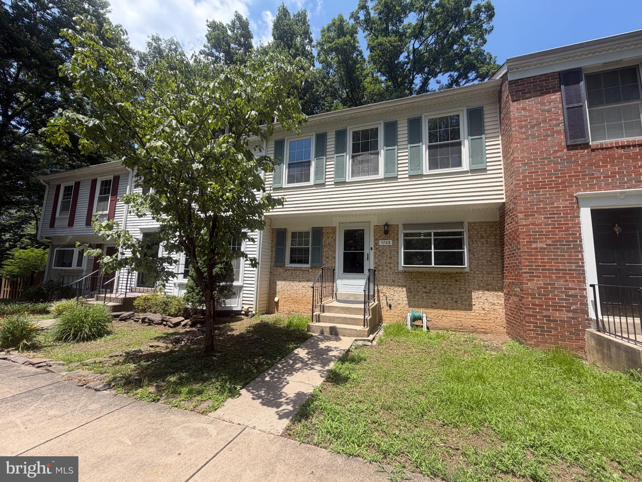 Spacious townhouse tucked away on a quiet cul-de-sac and backing to a peaceful wooded setting. The main level features ceramic tile flooring in the foyer, hallway, kitchen, and breakfast area, along with a spacious living room and dining room finished with hardwood flooring. The living room offers a cozy wood-burning fireplace, while the dining room opens to a private deck overlooking the trees. A convenient half bath completes the main level.
The upper level features an oversized primary suite privately situated at the rear of the home, complete with an en-suite bathroom. Two additional bedrooms and a full hall bathroom complete this level. The bedrooms and hallway feature hardwood flooring, while all bathrooms have ceramic tile flooring.
The walkout lower level offers ceramic tile flooring throughout, a full bathroom, a laundry area, and direct access to the open backyard and wooded common area, providing additional living space and seamless indoor-outdoor enjoyment. Roof and HVAC are replaced in 2016 and water heater in 2026.
Ideally located in a desirable community offering exceptional amenities, including tennis courts, a swimming pool, and a neighborhood park. Conveniently located near shopping, dining, major commuter routes, and everyday conveniences.