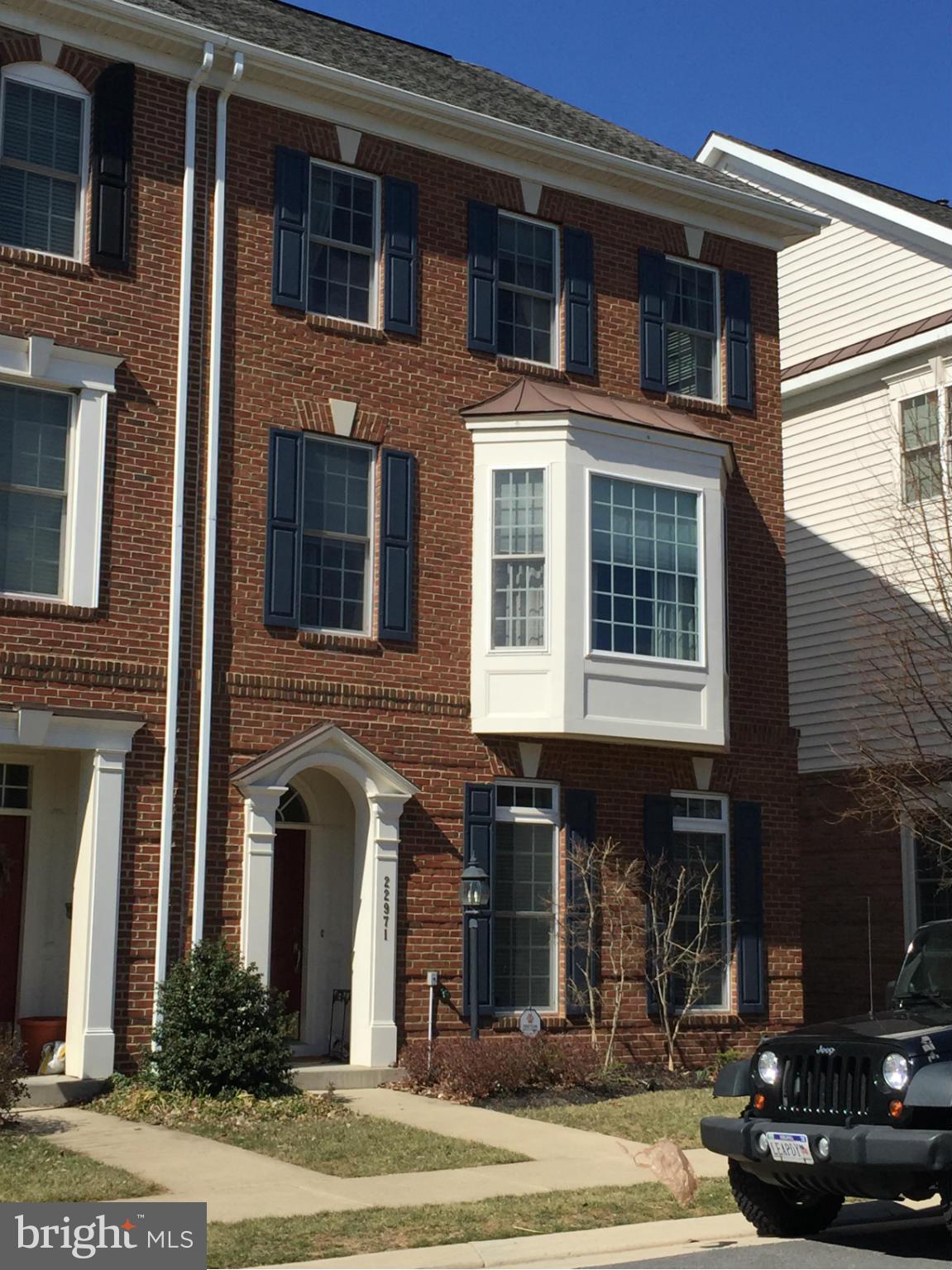 Fantastic, spacious townhouse with Georgetown flair! Three finished levels above grade, over 3700sf total! Formal living and Dining, main level Family room and morning room. Walkout to fenced brick patio and detached 2 car garage. Upper level 1 has HUGE Master with sitting room/Fireplace and luxury bath. Upper level 2 has office space and a large open loft perfect for game room/media/teen hangout.