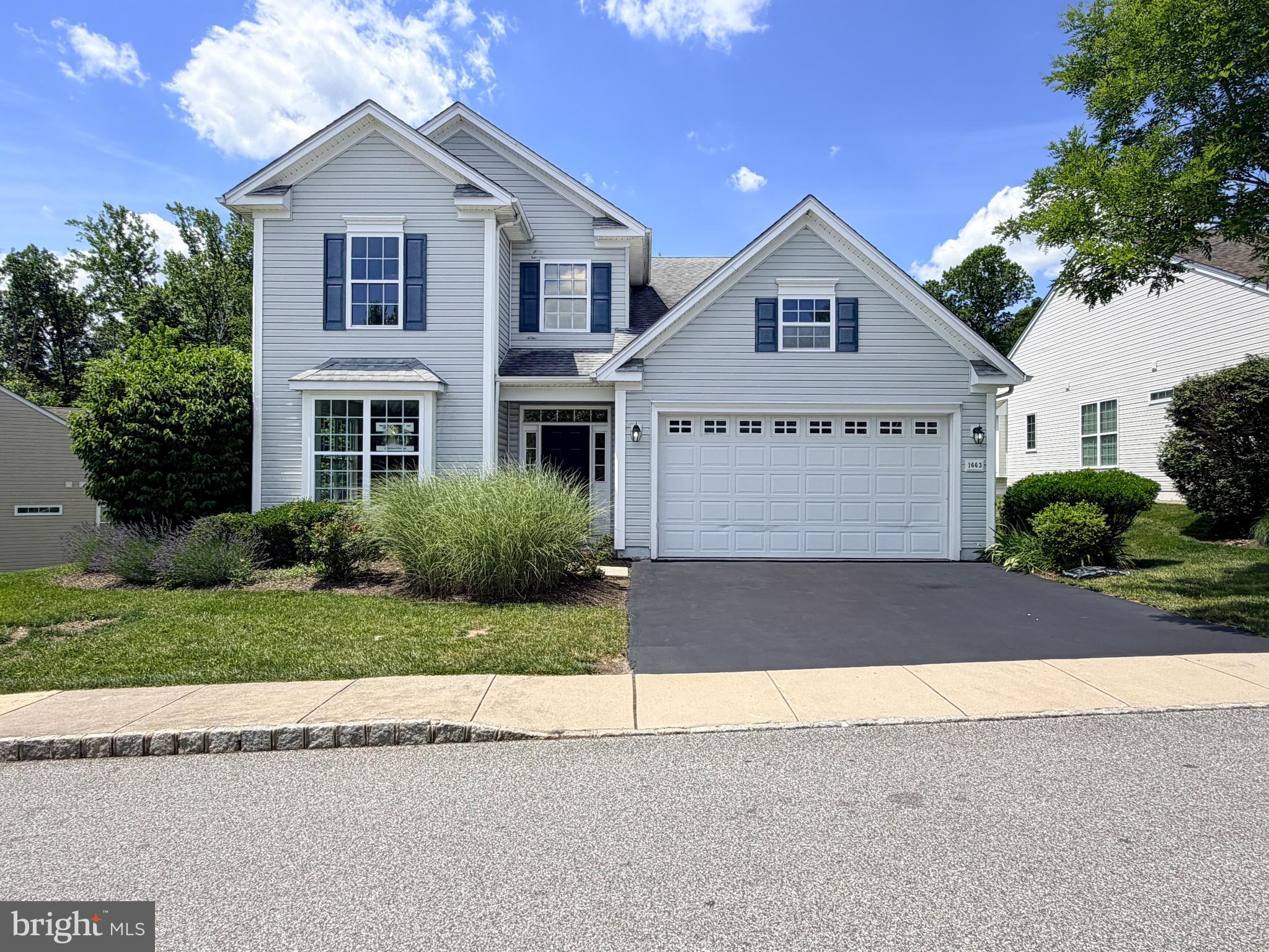 Welcome to 1663 Village Ave located in the highly desirable Foxfield 55+ community, offering exceptional amenities and low-maintenance living. This spacious home features the largest floor plan in the neighborhood. The first floor boasts a luxurious primary suite with a private en-suite bath and convenient first-floor laundry. The open-concept living and dining areas flow seamlessly into the brand-new kitchen, showcasing new flooring, stainless steel appliances, stunning quartz countertops, and an impressive 10-foot center island perfect for entertaining. A second bedroom and full bath on the main level provide ideal space for guests or a home office. An oversized two-car garage and full laundry room complete the first floor. Upstairs, you'll find two generously sized bedrooms, a full hall bath, and a large walk-in attic/storage area. Fresh paint and new carpeting throughout make this home truly move-in ready. Enjoy resort-style amenities including a clubhouse, indoor and outdoor pools, fitness center, walking trails, and more. Conveniently located near shopping, dining, and major routes, all within the award-winning Garnet Valley School District. This exceptional home is a must-see!