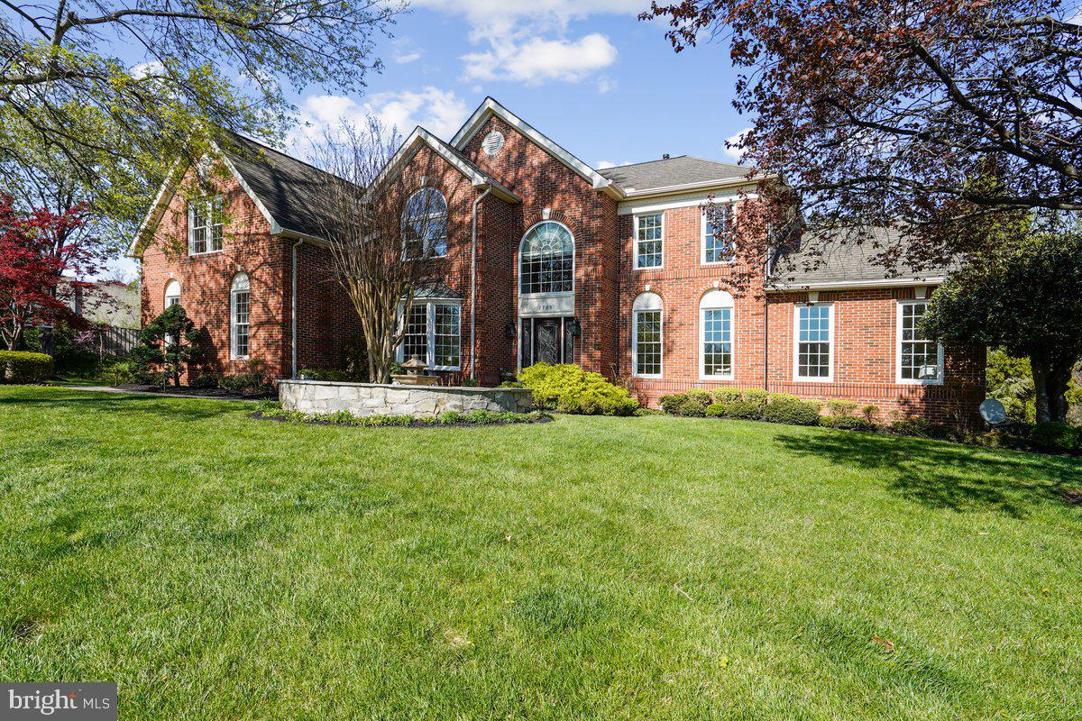 REDUCED $100K! OVER $650K in UPDATES! Set on a private .60-acre cul-de-sac lot in the sought-after Hunter Mill Estates, this stunning colonial delivers over 5,800 square feet of thoughtfully refined living. A custom stone walkway and lush landscaping create an elegant first impression, while the extensively landscaped rear yard features a beautifully designed patio, open lawn space, and mature trees beyond, all complemented by in-ground irrigation and landscape lighting.
Inside, a welcoming open floor plan flows effortlessly from room to room, anchored by newly refinished hardwood floors and dual staircases with custom wrought iron spindles. The main level balances elegant entertaining and everyday comfort with a private office, formal living and dining rooms, a sunroom retreat, and a dramatic two-story family room where a soaring wall of windows floods the space with natural light, centered on a stunning marble fireplace.
The renovated gourmet kitchen is impeccably appointed with a Sub-Zero refrigerator, double ovens, a dedicated beverage and wine refrigerator, rich granite countertops, and custom soft-close cabinetry. A bright and airy skylit breakfast room flows naturally onto the screened-in porch with updated Trex decking and generous deck space, overlooking the tranquil stone waterfall, expansive patio, and beautifully landscaped backyard for a seamless indoor-outdoor connection.
On the upper level, rich hardwood floors continue throughout. The primary suite is a true sanctuary, offering spacious walk-in closets with custom organizers and a fully renovated spa bath with soaking tub, dual vanities, and elevated finishes. Every additional bedroom is ensuite, with built-in closet organizers and blackout blinds for comfort and privacy.
The walk-out lower level is designed for both entertaining and flexible living with a spacious recreation room, full custom bar, a versatile bonus room ideal as a second office or home gym, private fifth bedroom, and a luxurious fourth bath with steam shower and built-in sauna. A second half bath and direct patio access complete this exceptional level, where cascading stone waterfalls and lush landscaping create an outdoor escape.
Meticulously maintained and extensively updated, this home offers newer plumbing and lighting fixtures, fresh whole-house paint, elegant moldings, updated major systems including dual HVAC systems, water heater, garage doors, a refinished driveway, and new front-facing windows, making this a truly turnkey opportunity.
Conveniently located near the W&OD Trail, Hunter Mill Swim & Racquet Club, Silver Line Metro, and Dulles Toll Road, this exceptional home offers an elevated lifestyle in one of Vienna's most desirable neighborhoods.