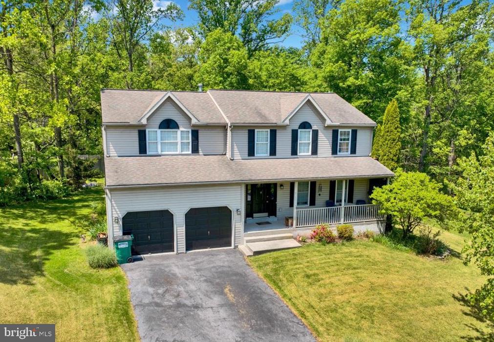Welcome to 511 Garfield Avenue in the Daniel Boone School District! This spacious home offers over 2,900 square feet of living space with four bedrooms, two full baths, and two half baths, providing plenty of room for comfortable everyday living.  Situated on a beautiful half-acre lot (.49-acres), the property features a private backyard retreat complete with a stunning two-tiered deck and pool - a perfect setting for summer gatherings, relaxing evenings, or enjoying the peaceful surroundings.  Inside, you will find generous living spaces throughout, including a finished basement with an additional half bath, offering endless possibilities for a recreation room, gym, or home office. Conveniently located near local shopping, restaurants, and everyday amenities, this home combines privacy, space, and accessibility in one desirable location. Do not miss the opportunity to make this property your next home!