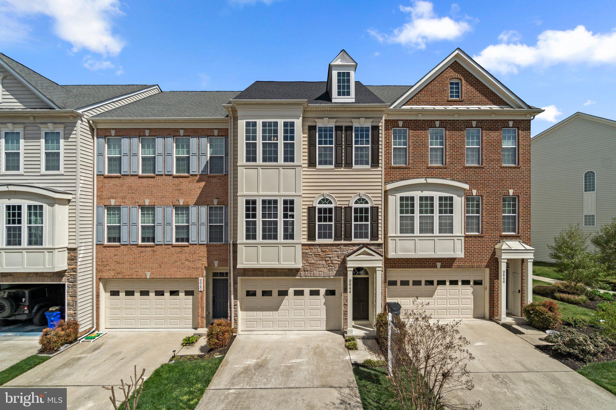 Want the best of both worlds? The low maintenance living of a townhome yet over 3,000 square feet of space with a 2 car front load garage, deck and backyard? Welcome to 9644 Bothwell Lane. This spacious 22’ wide townhome boasts 3,020 sf on three finished levels, featuring 3 bedrooms, 3.5 bathrooms with 9’ ceilings throughout in sought after Urbana Highlands. The lower level features a two car front load garage, full bathroom, large light filled rec room with two full size windows and walkout door that steps out into the spacious rear yard which backs to HOA maintained common area. The main floor is designed to entertain with a huge family room in the front which opens to the spacious kitchen/breakfast room combo in the rear. Just off the breakfast area is a composite deck with the perfect exposure to enjoy morning sunrises and the benefit of shade in the afternoon. The upscale kitchen is adorned with rich maple cabinets, granite countertops, stainless steel appliances, and a large island with overhang for seating. Finally, the upper level consists of an amazing Owners Suite with tray ceiling, two large walk in closets, sitting area and a spa like owners bathroom with separate tub and shower. Just down the hall is the laundry room and hall bath as you make your way to the two large secondary bedrooms in the front. All these features along with its prime location in Urbana Highlands where you’ll enjoy easy access to nearby shops, restaurants, sought after schools and incredible amenities. Showings start Friday 4/11.