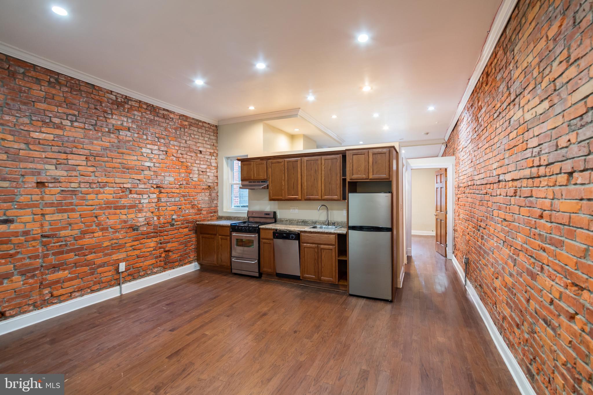 *Available NOW!*

1 bedroom, 1 bathroom apartment located on the 1st floor of the building, available on Broad Street in South Philadelphia! Unit features 500 square feet of living space and high-end finishes throughout. Enjoy hardwood floors, exposed brick and stainless steel appliances in the kitchen. The kitchen comes fully equipped with a refrigerator, electric range, dishwasher and garbage disposal, and granite countertops for your cooking needs. Additional amenities include a shower/tub combination in the bathroom, a spacious bedroom with its own closet, a fully integrated intercom system and mini-split heating and cooling! Best of all, you also have access to your own patio space in the rear of the building that is perfect for relaxing in during summer months.

*Sorry, no pets