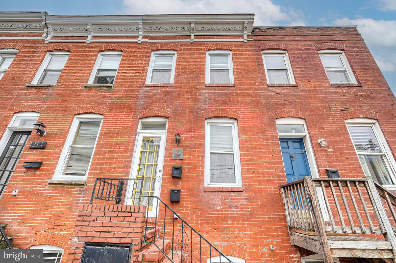 Location, Location, Location!!! This lovely brick townhome is charming , cozy and is located in historic Federal Hill minutes away from the Inner Harbor, Raven's Stadium,  Cross Street Market, many restaurants, bus stops, parks and so much more.  Imagine walking to and patronizing your local businesses not having to drive everywhere for necessities.  Main level has the living room, dining area and recently renovated kitchen with its granite counter tops and stainless steel appliances.  Many of the walls in the house are brick and flooring wood which adds to the overall ambiance of serenity.  In the middle of the main level, the staircase leads you upstairs to one primary bedroom with primary bathroom and second bedroom with a hallway full bathroom.  The primary bedroom has a door that leads to an outside balcony area....walk up some stairs and you are on the rooftop area overlooking the neighborhood and parts of the city.  Basement has tile flooring and houses the laundry room and storage area  You don't want to miss this rental.  Come tour your new home!