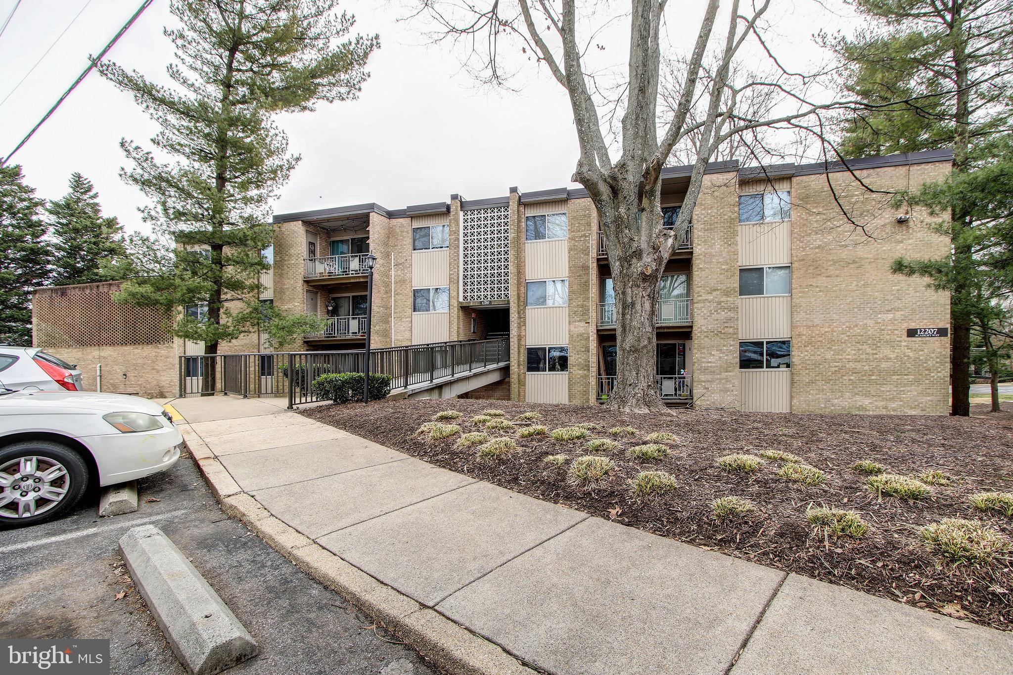 Convenient first floor condo featuring 3 Bedrooms and 2 full Bathrooms. Open concept living and dining room with hardwood floors throughout. Walk-out from dining room to private outdoor patio.  Galley kitchen with lots of storage space. 2 Spacious Bedrooms with plenty of closet space. Large hallway bathroom with tile shower.  The master bedroom is huge with a walk-in closet and en-suite bath.  Condo fee includes ALL utilities! Located minutes from Rockville Pike, I-270, and the Beltway. Walking distance to shopping and restaurants.