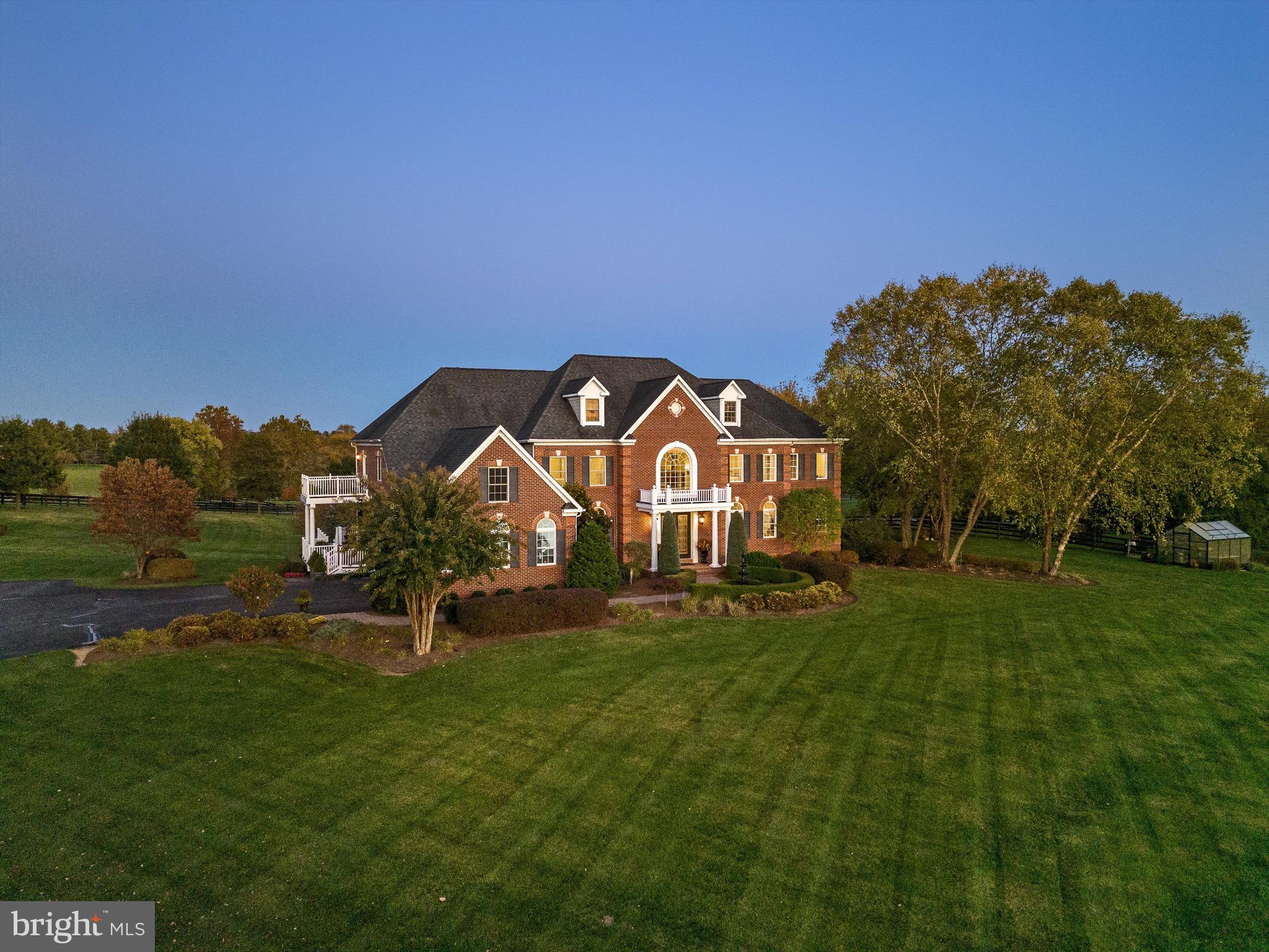 Welcome to this stunning custom estate home nestled on over 12 acres in desirable Catoctin Creeks surrounded by high-end custom homes on large parcels.  Over 7,100 square feet, this exquisite property offers a perfect blend of luxury and comfort, making it an ideal retreat for those seeking a private and serene lifestyle.  Perfectly sited to enjoy mountain and pastoral views.  As you step through the grand two-story entryway, you are greeted by the elegant double staircases with the two-story family room just beyond. Formal living and dining rooms, main-level study plus a light-filled sunroom to enjoy the views.  The main level boasts a gourmet kitchen equipped with Sub Zero refrigerator (2020), dual dishwashers, a 48” Jenn-Air double oven with 6 burner gas range.  Rare 5 bedrooms with 4 baths upstairs. Primary bedroom with sitting room, tray ceiling and a Juliet balcony.  Property is in Land Use--Seller shall not be responsible for rollback taxes.

The walkout lower level includes a 6th bedroom, (in-law suite), recreation room and wetbar.