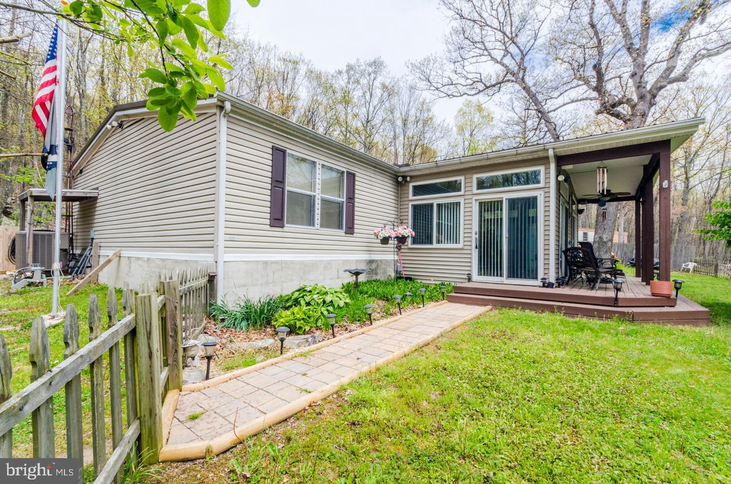 Retreat style home would be perfect for the weekends or full time living. Totally private location and setting on over 11 acres of unrestricted land, No HOA here! Home features Guardian whole house generator for added security , 3 bedrooms , 2 baths, laundry, living room and family room with wood stove and lots of windows that make for a spacious open floor plan. Large deck area for entertaining or just watching the wildlife roam by. The 14 by 70 workshop with electric and garage door comes in handy for storing the 4 wheeler and canoes. Good hunting on the property and not far from the Sidling Mt WMA for extra room to roam.  You owe it to yourself to look at this one , it could be just what your'e looking for!