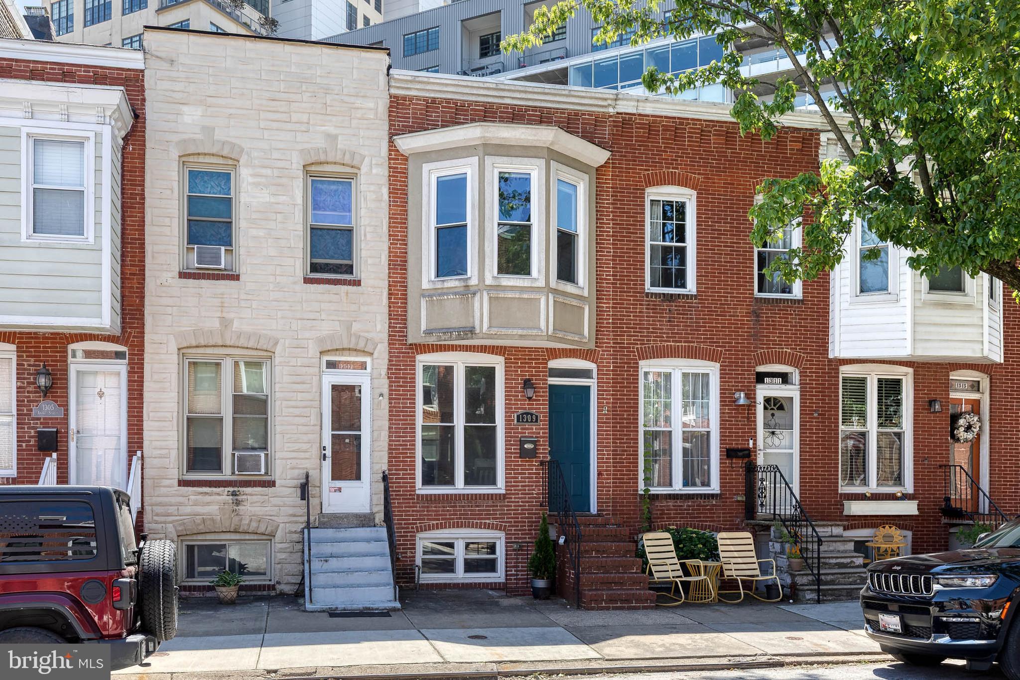 Exceptional Properties. Exceptional Clients. OFF STREET PARKING! Welcome to 1309 Andre Street, where the best of Locust Point is quite literally right outside your front door. Start your morning with a walk to Cool Beans for coffee, grab lunch at City Limits, and finish the day with a sweet treat from Ice Queens, all within five minutes of home. Spend weekends exploring Latrobe Park, strolling the waterfront at Fort McHenry, or enjoying everything that makes Locust Point one of Baltimore's most sought-after neighborhoods. Inside, the home's thoughtful three-bedroom, three-bathroom layout offers flexibility for every stage of life. It is perfectly suited for a couple looking for extra space to work, host guests, or grow into the future. At the same time, the unique floor plan easily accommodates three roommates, with each bedroom paired with convenient access to its own bathroom. Step outside to enjoy your private rear deck, ideal for summer evenings, weekend gatherings, or a quiet cup of coffee. Parking behind the home provides a convenience that's hard to find in the city, while the potential for a future rooftop deck creates an exciting opportunity to take full advantage of the neighborhood views. What truly makes 1309 Andre Street special is the lifestyle it offers. With three bedrooms, three bathrooms, parking, outdoor living space, and one of the best locations in Locust Point, 1309 Andre Street is a rare opportunity to own a home that combines comfort, convenience, and community in equal measure.Highly regarded neighborhood schools, including Francis Scott Key Elementary/Middle School and Thomas Johnson Elementary/Middle School. Roof 2022