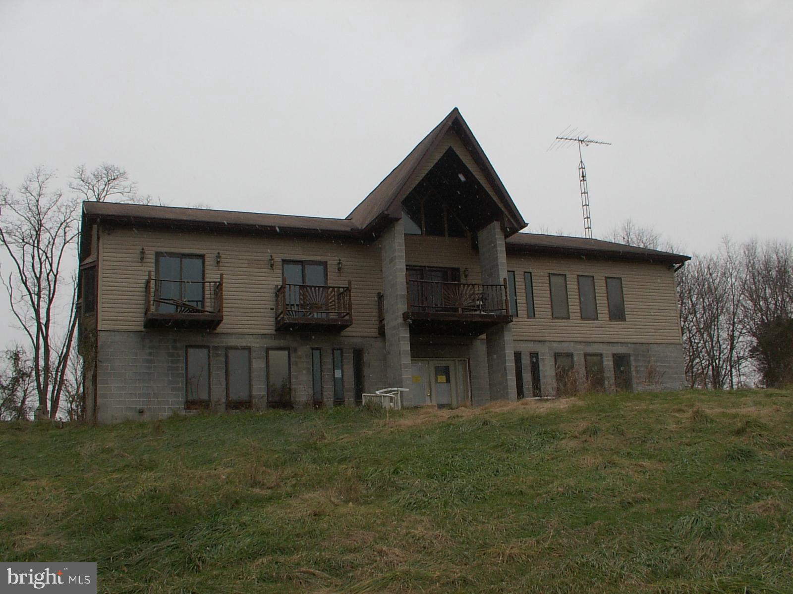 See docs for required offer guidelines. Freddie Mac First look ends May 28, 2019 for owner occupant offers. EMD to CENTURY 21 Braddock Realty. Must be certified funds with buyer's name as remitter on check. Sold As-IS. Lots of potential with this spacious contemporary sitting on 2.88 acres. Put on your tool belt and bring your imagination. Features large bedrooms, balconies, Bedroom level laundry room. Come bring this unique home back to life.