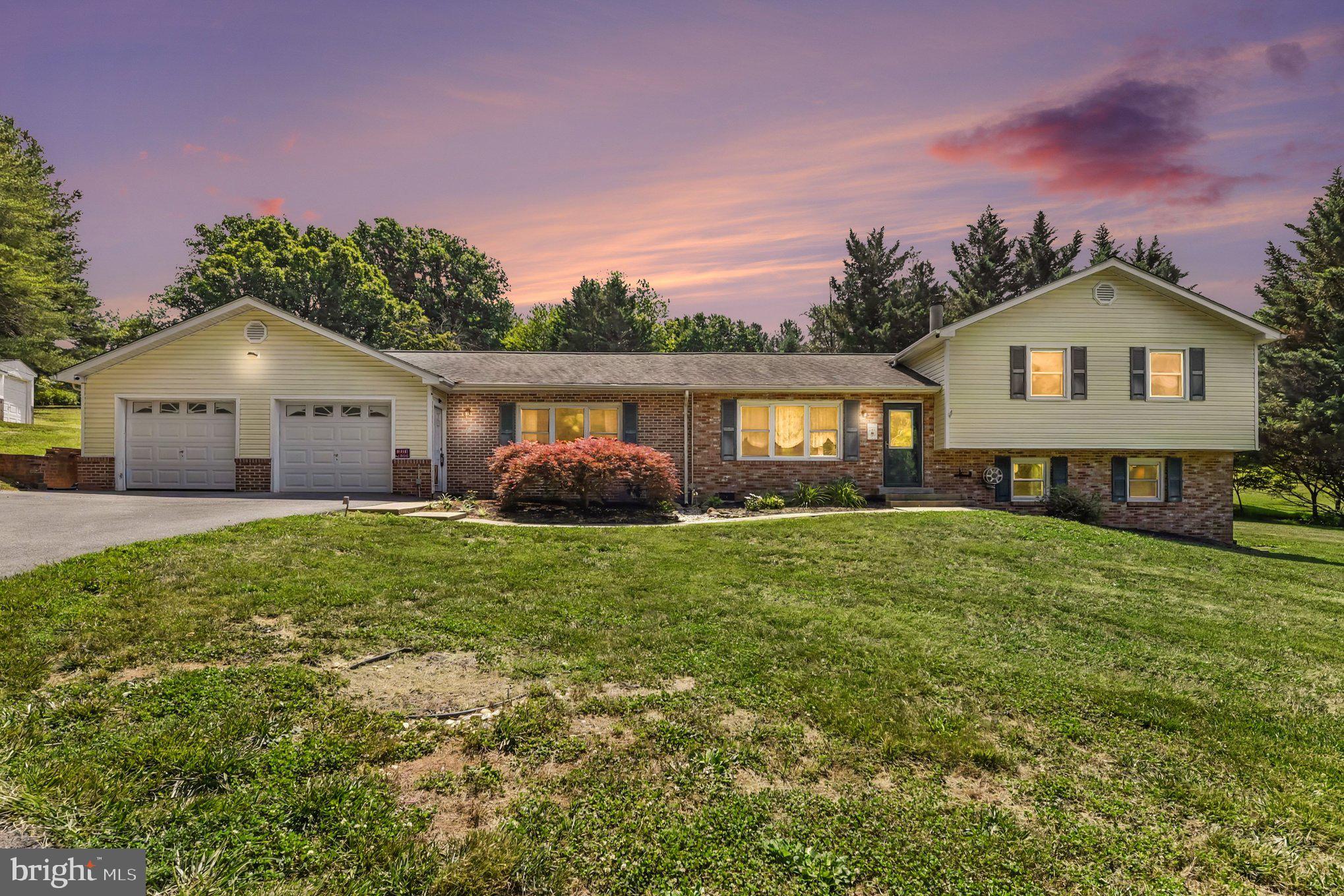 Nestled on 1.57 peaceful acres just minutes from downtown Mt. Airy and I-70, this well-maintained 3-bedroom, 2.5-bath home offers over 2,100 finished square feet, combining the tranquility of country living with the convenience of nearby shopping, dining, and commuter routes, all with no HOA.
The backyard is the true centerpiece of the property. A spacious deck provides the perfect setting for entertaining, complete with a charming gazebo and a tranquil fish pond that creates a relaxing outdoor retreat. Whether you're hosting summer cookouts or enjoying a quiet morning coffee, this outdoor space is designed to be enjoyed year-round.
Inside, you'll find comfortable living spaces, updated bathrooms, and a cozy lower-level family room featuring a fireplace for chilly evenings. The finished lower level also offers a separate exterior entrance and can be closed off from the main level, providing flexible space for guests, hobbies, a home office, or even as a 4th bedroom.
The oversized attached garage offers exceptional versatility with space for multiple vehicles, a workshop, and abundant storage. Two additional storage sheds provide even more room for lawn equipment, tools, and outdoor gear.
If you've been searching for a home with acreage, privacy, generous outdoor living space, and room to make it your own, this property offers a wonderful opportunity in a highly convenient Carroll County location.
