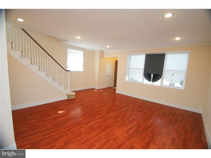 WOW! Look no further, good things come to those who wait! Unbelievable West Oak Lane Home Completely Knocked Out, ready for you to move into! Do you like elegance? Well this home is one of a kind and offers every extra a buyer can want. The entire home has new windows, a new roof w/ warranty, all new siding, updated electric & updated plumbing, and not to mention all new efficient Heating & AC Units! The 1st floor features a huge open layout with Brazilian Cherry floors, recessed lighting, a new kitchen, which features ALL NEW appliances! The upstairs features 3 good sized rooms, and a state of the art spa bath. The master features its own private bathroom as well! Other key features include a completely tiled full bathroom and a full finished walk-out basement for your convenience. There is also a deck off the kitchen, perfect for entertaining! This home truly has it ALL and is a MUST SEE!